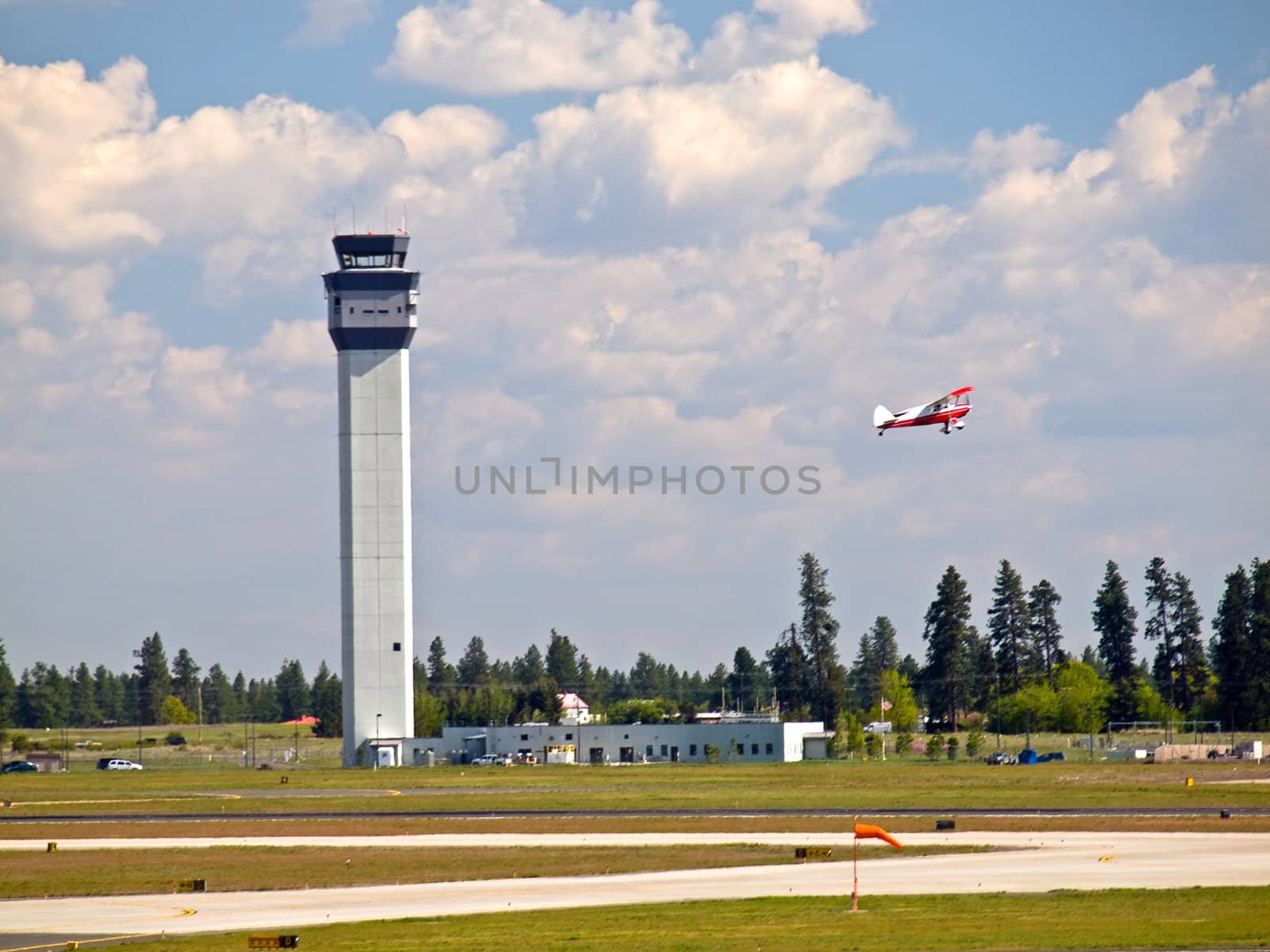 Air Traffic Control Tower of a Modern Airport with Aircraft Taking Off by Frankljunior