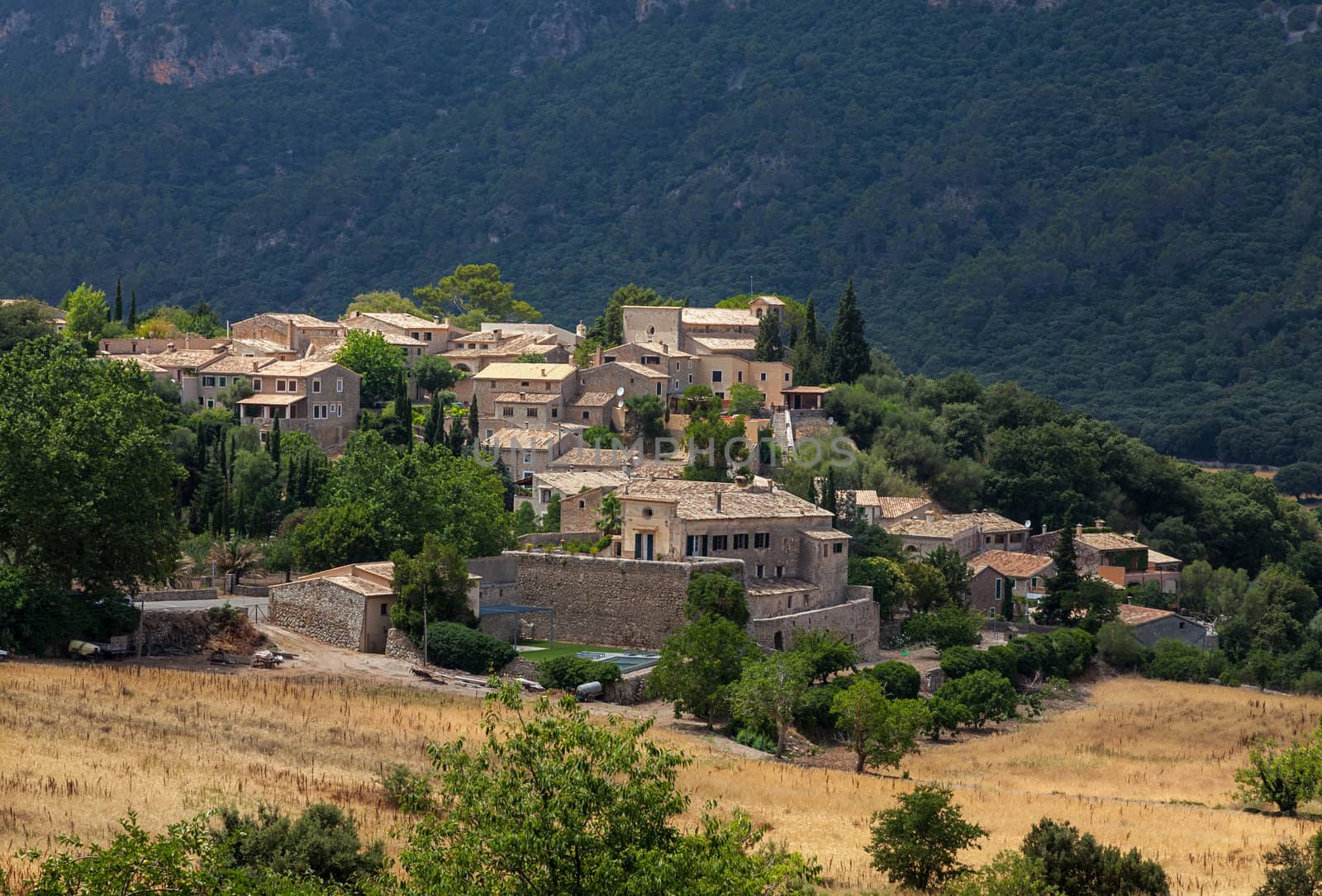 Image of a specific mountainous Spanish town located in Mallorca in Balearic Islands. The town is Orient.