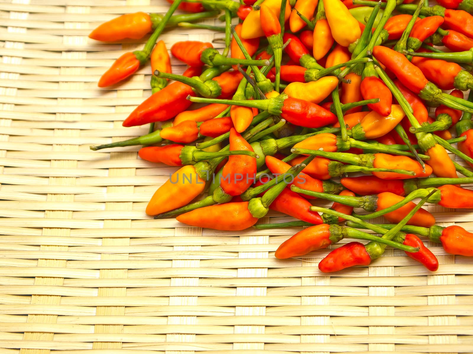 Colorful chili on basketwork