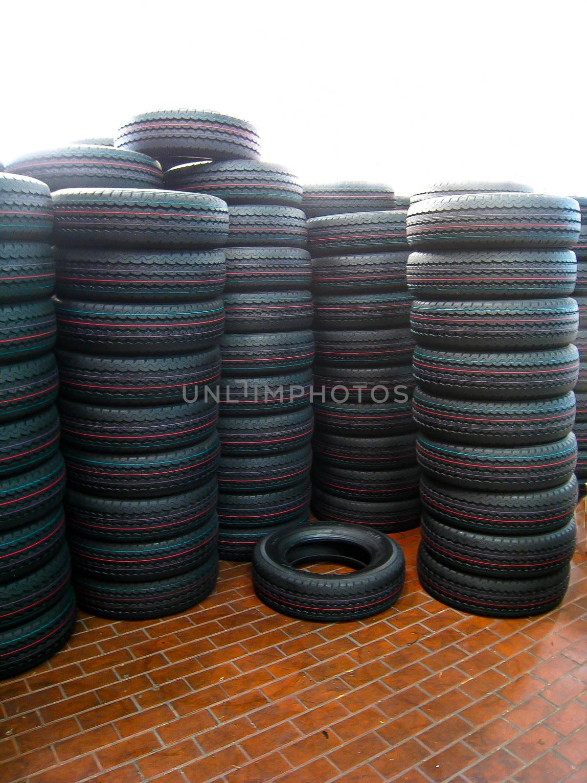 Lots of tire on the floor by gjeerawut