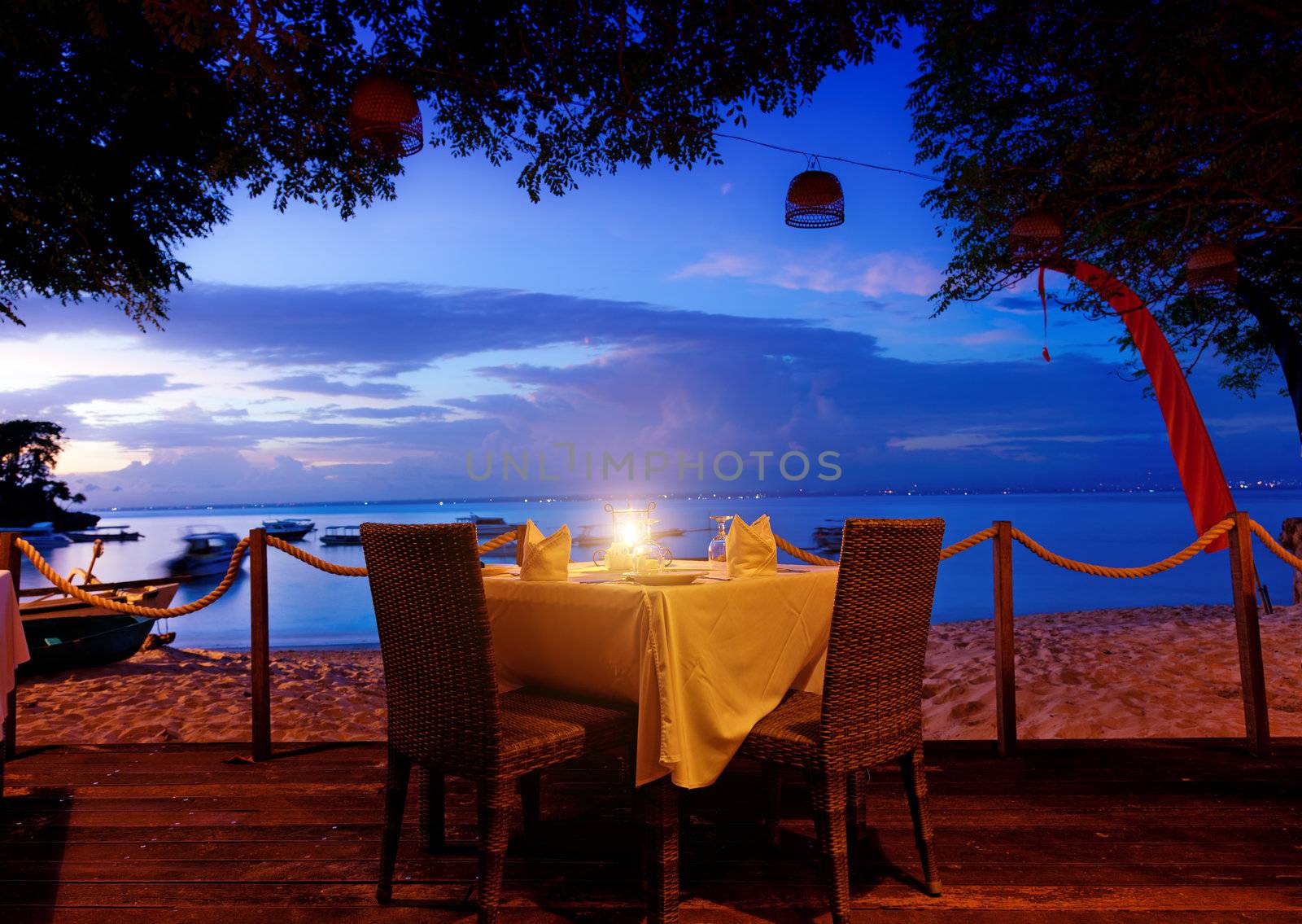 dinner on sunset at beach in Bali, Indonesia 