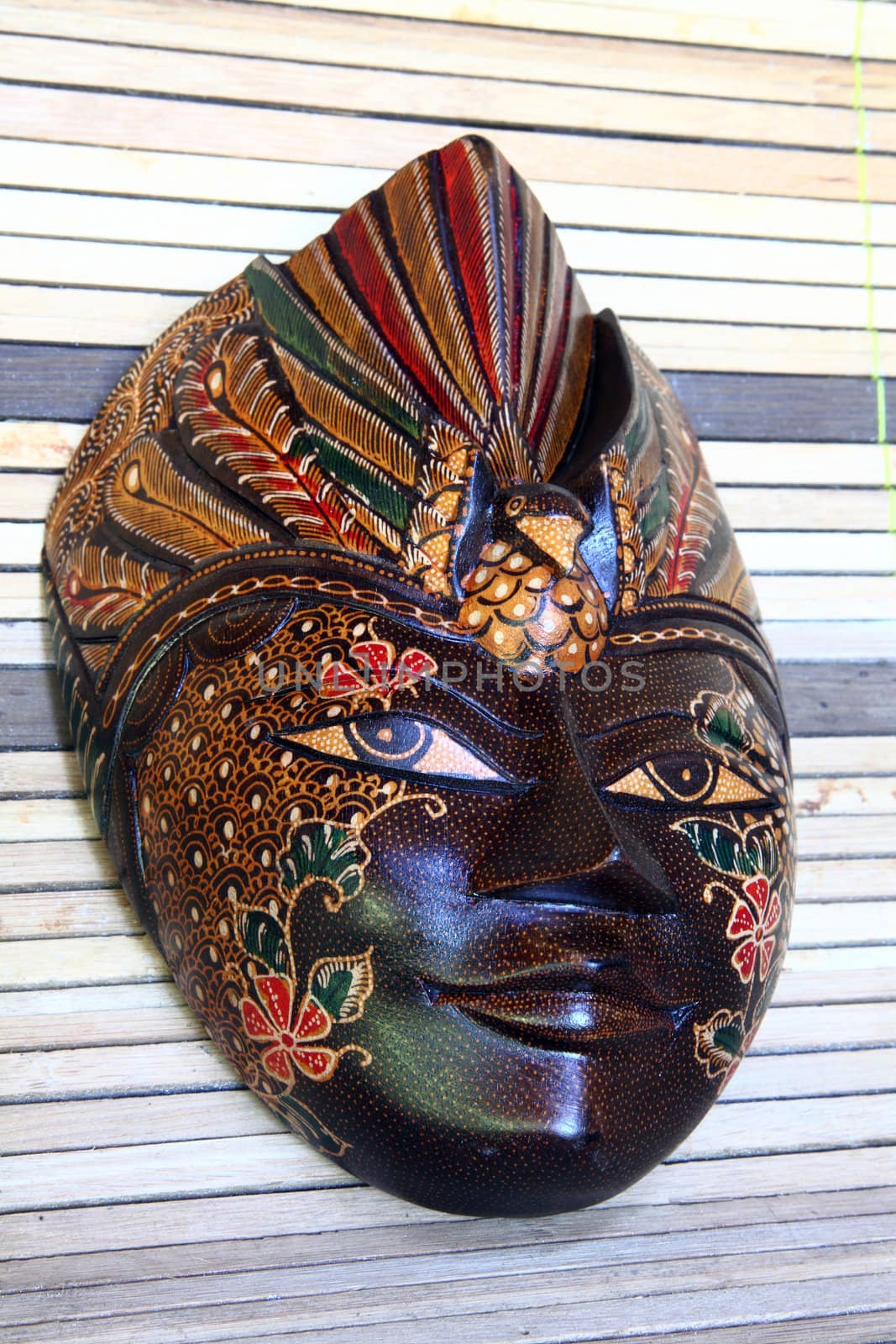 Hand crafted wooden masks work the Gunung Kidul Yogyakarta and sold for souvenir photos