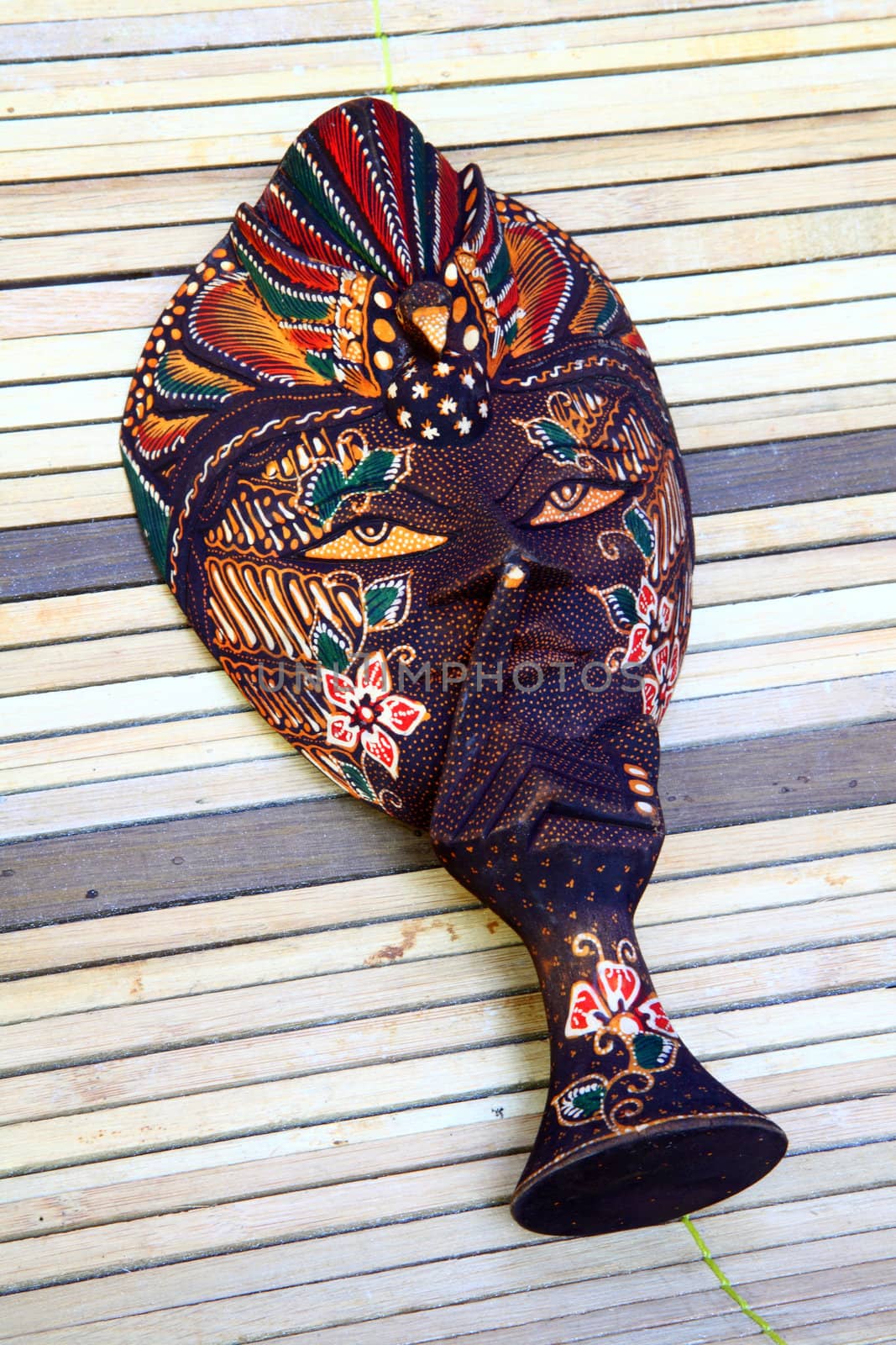 Hand crafted wooden masks work the Gunung Kidul Yogyakarta and sold for souvenir photos