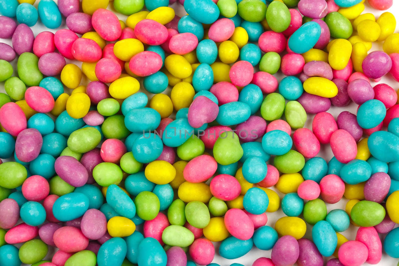 Color candies beans background by Verdateo