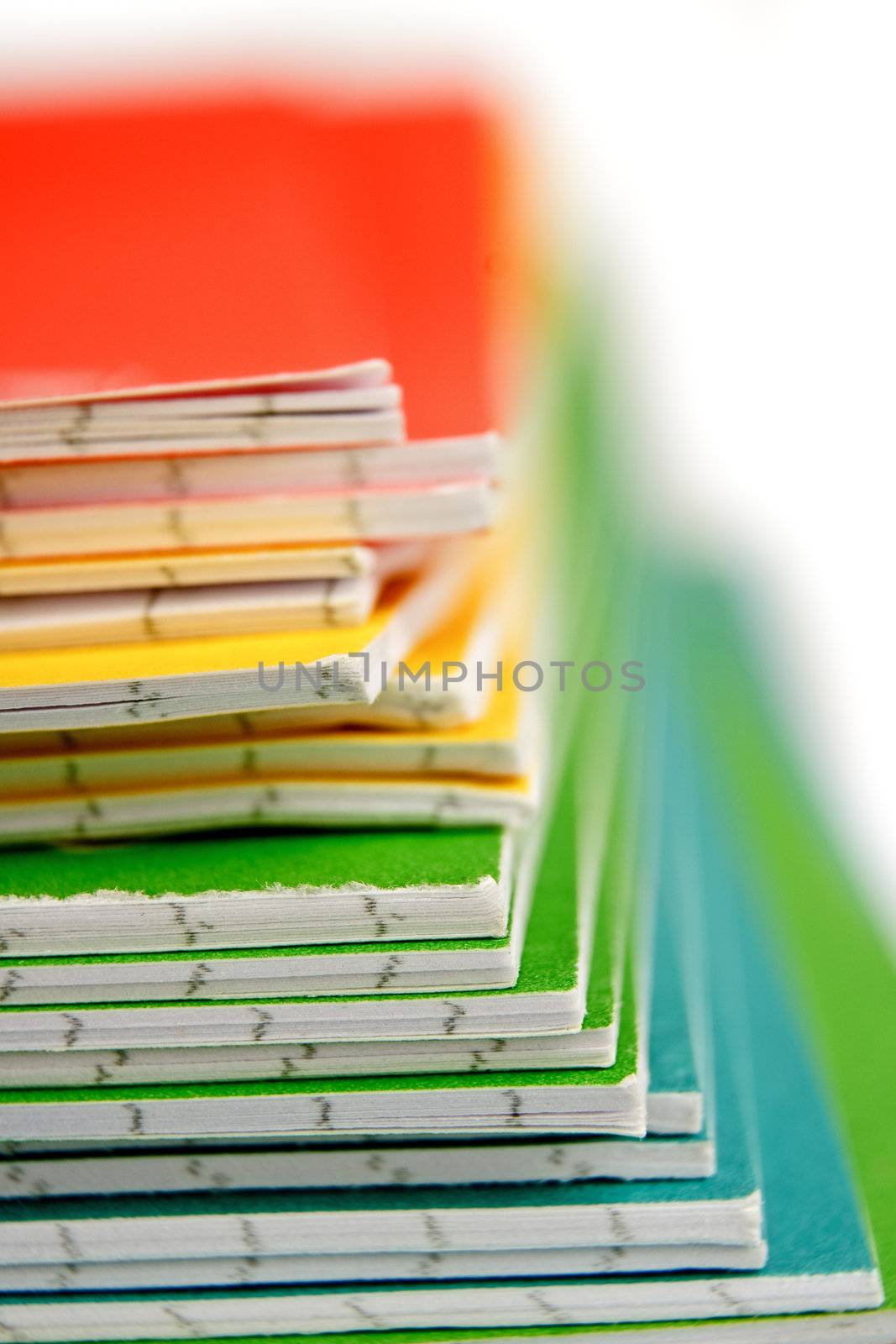 Color notebooks stack background