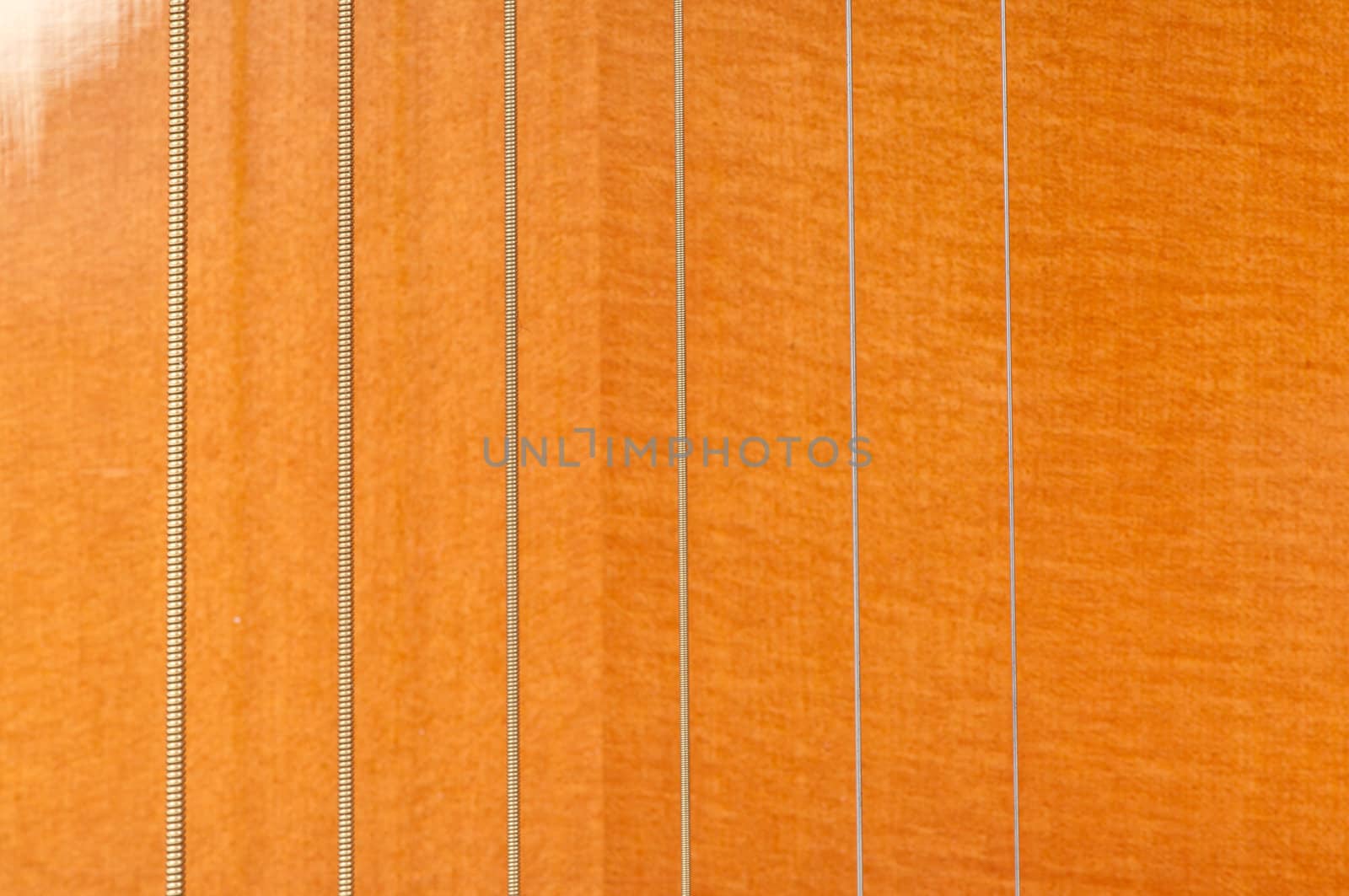 metal strings of the classical six-string acoustic guitar