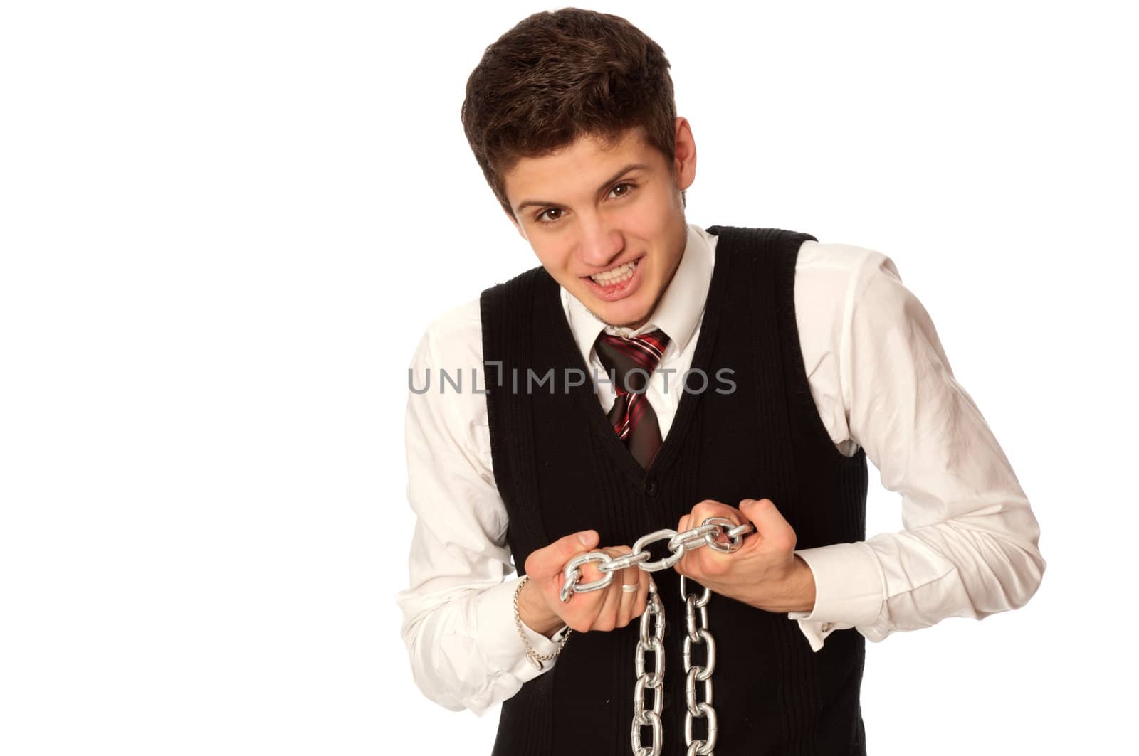 businessman breaking the chain by hands for liberation as a symbol of work captivity