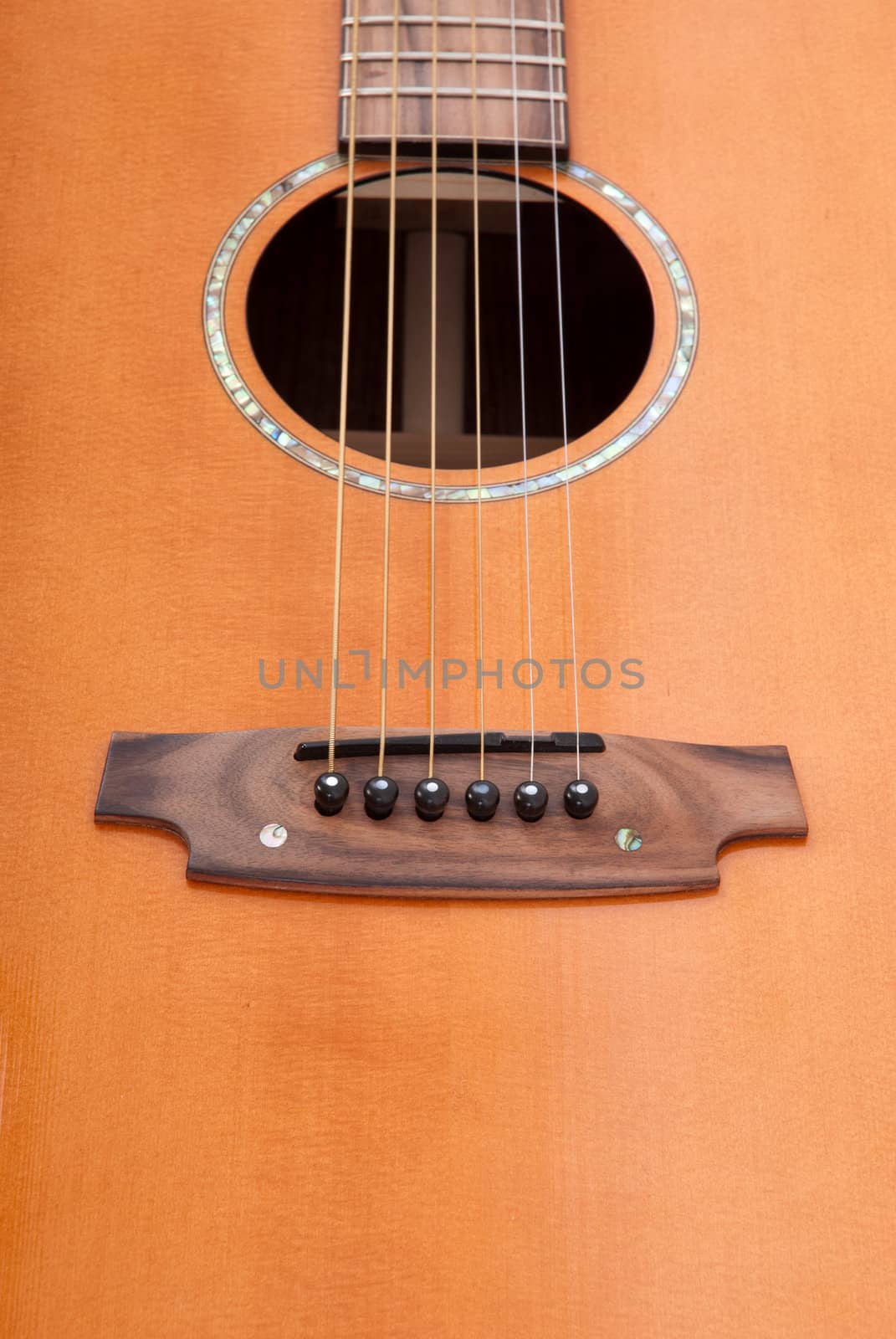 metal strings of the classical six-string acoustic guitar