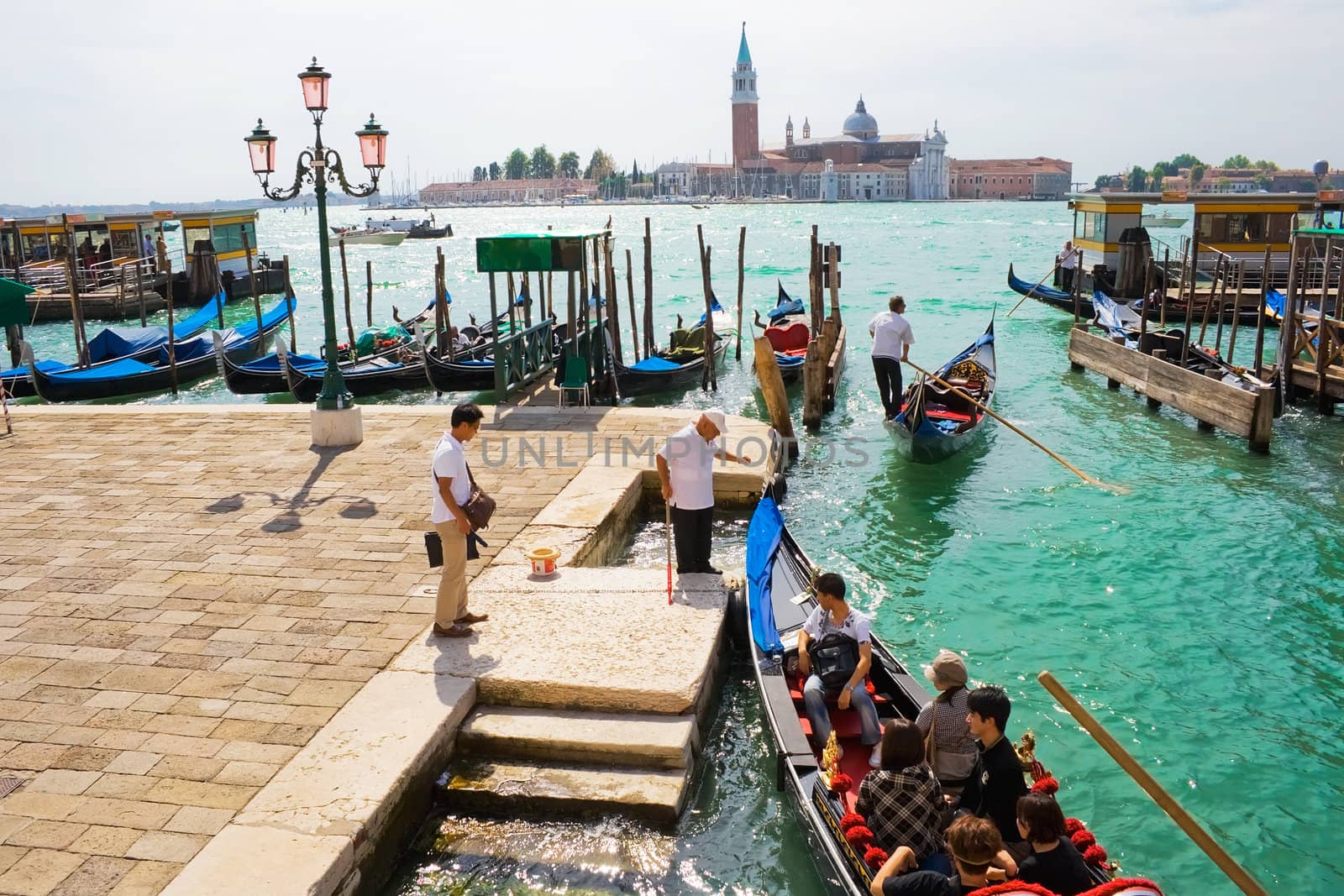Traditional gondolas on the canal in Venice, Italy