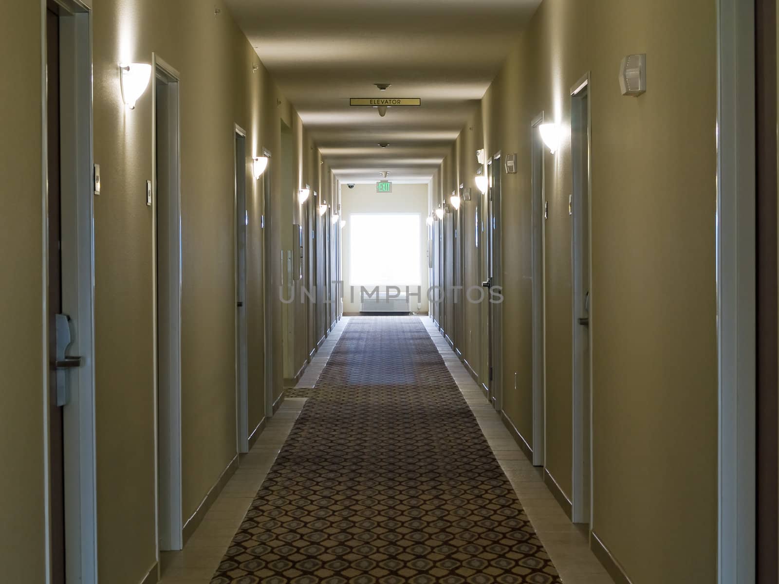 Empty hotel corridor in monochrome sepia color tone by Frankljunior