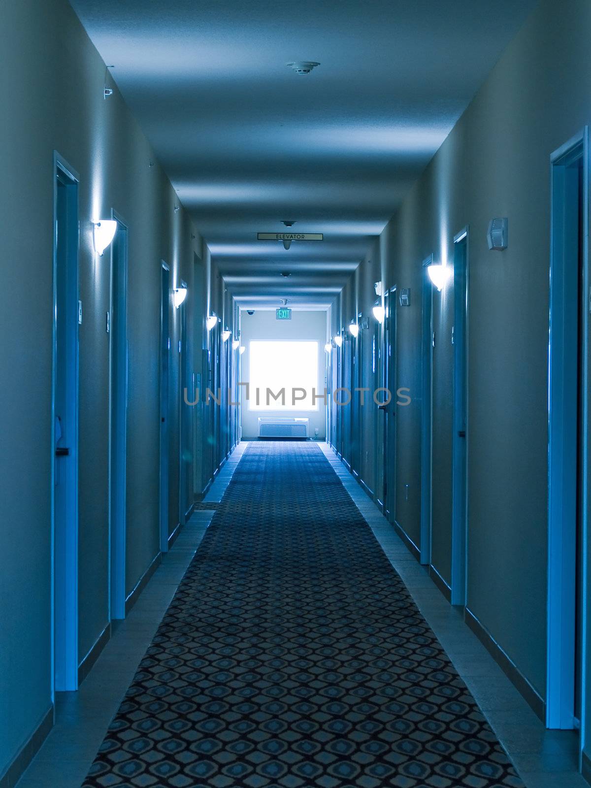 Empty hotel corridor in monochrome blue color tone by Frankljunior