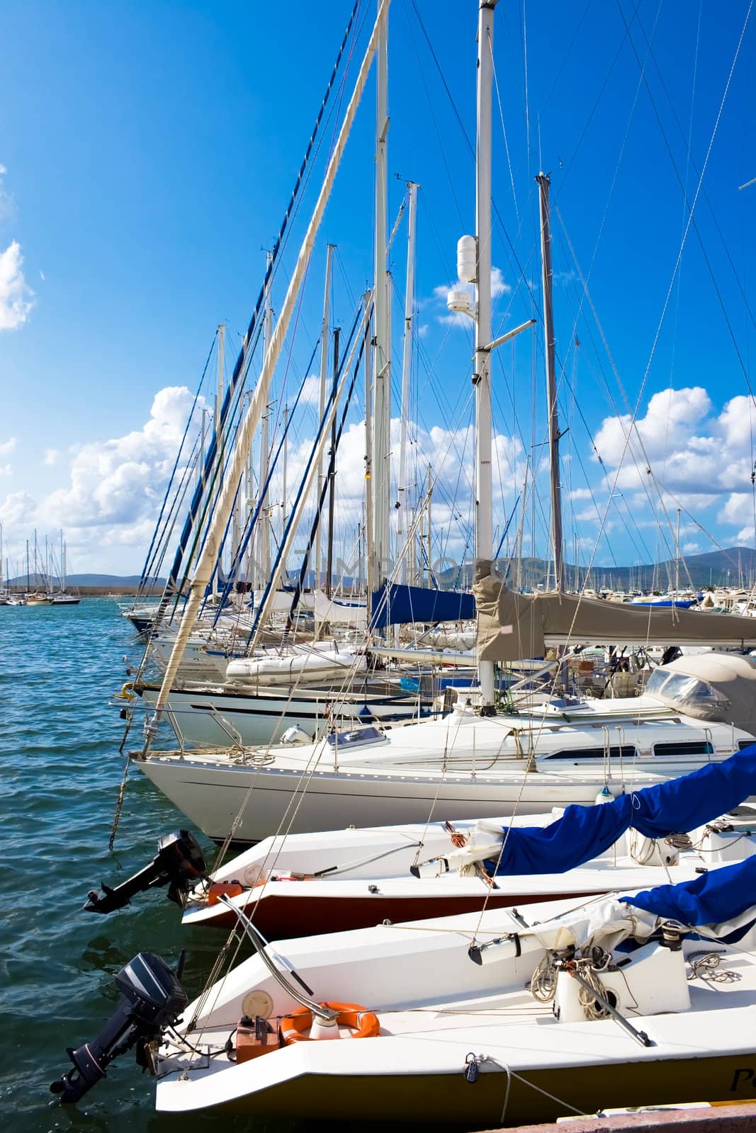 Classic white yachts ancored in Alghero, Sardinia