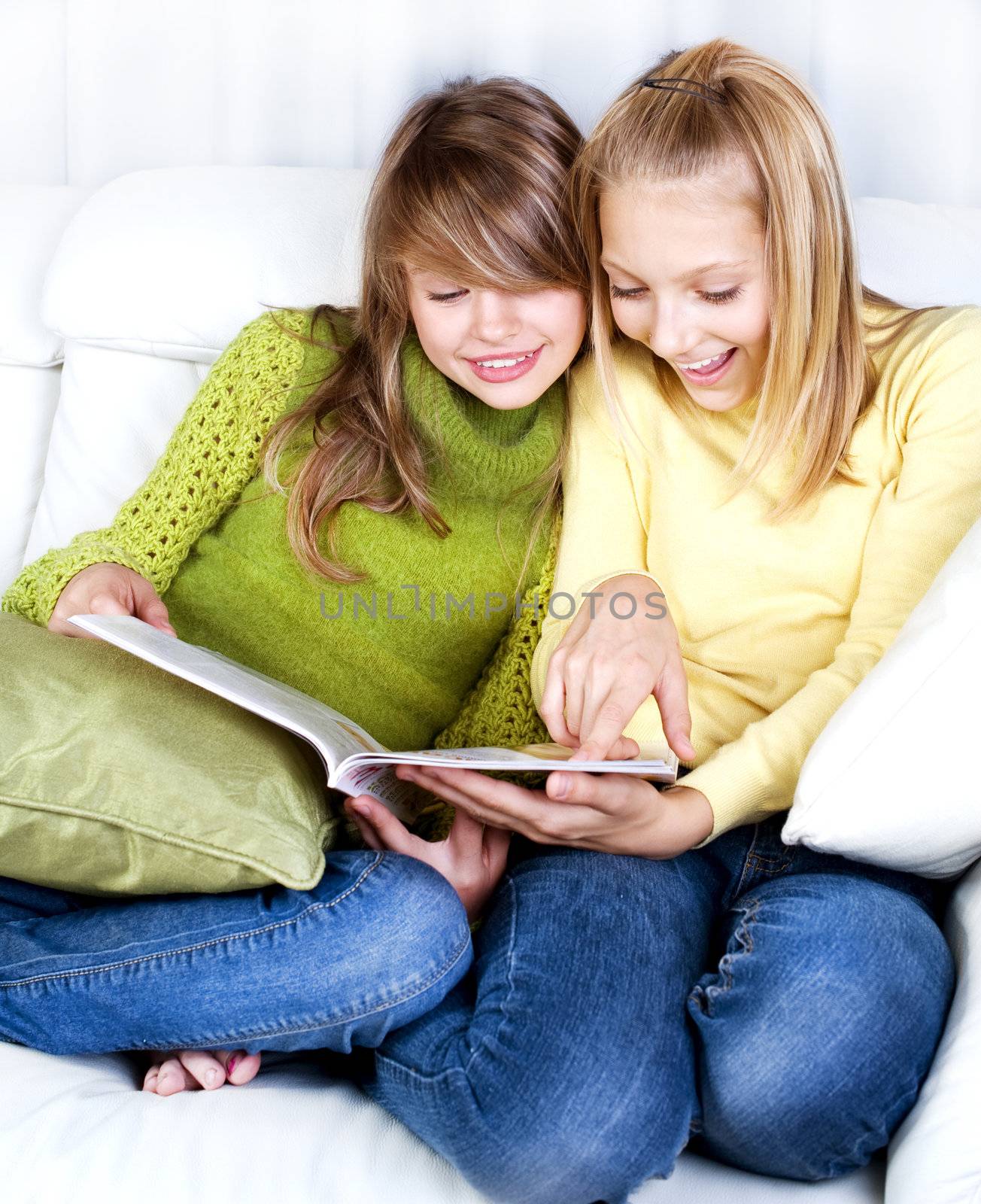 Teenage Girls reading fashion Magazine by SubbotinaA