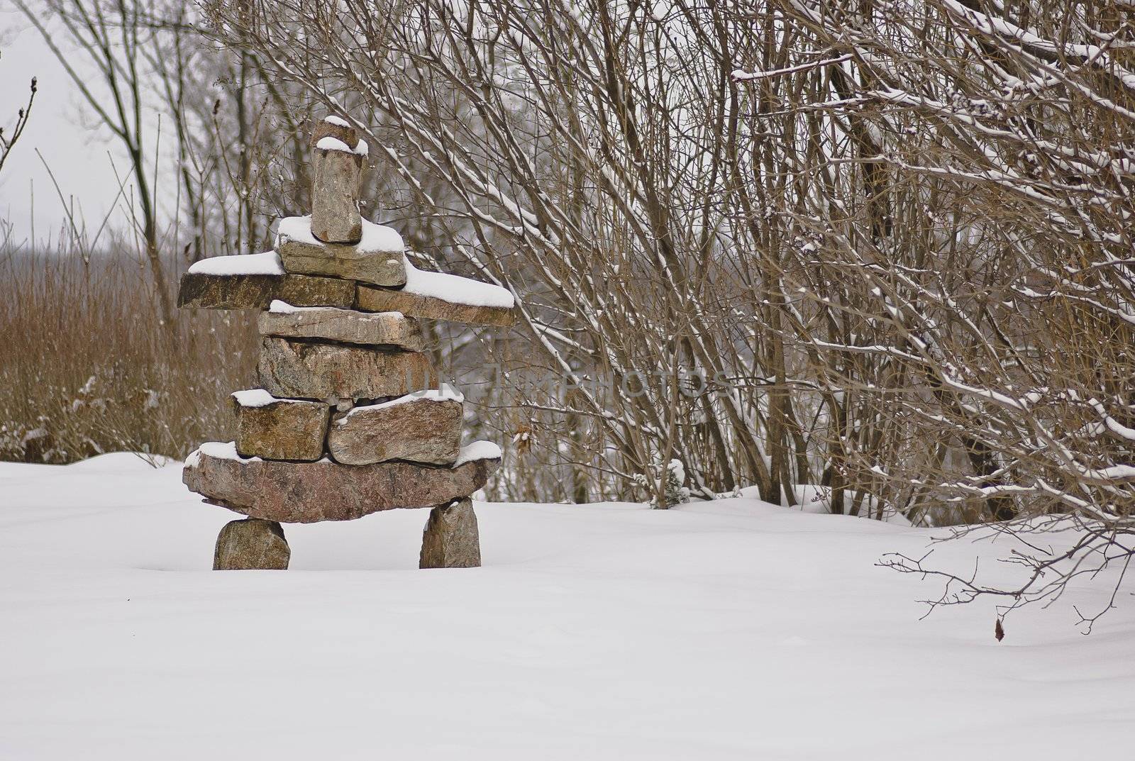 Inukshuk structure at the Governor General's home in Ottawa, Canada during winter.