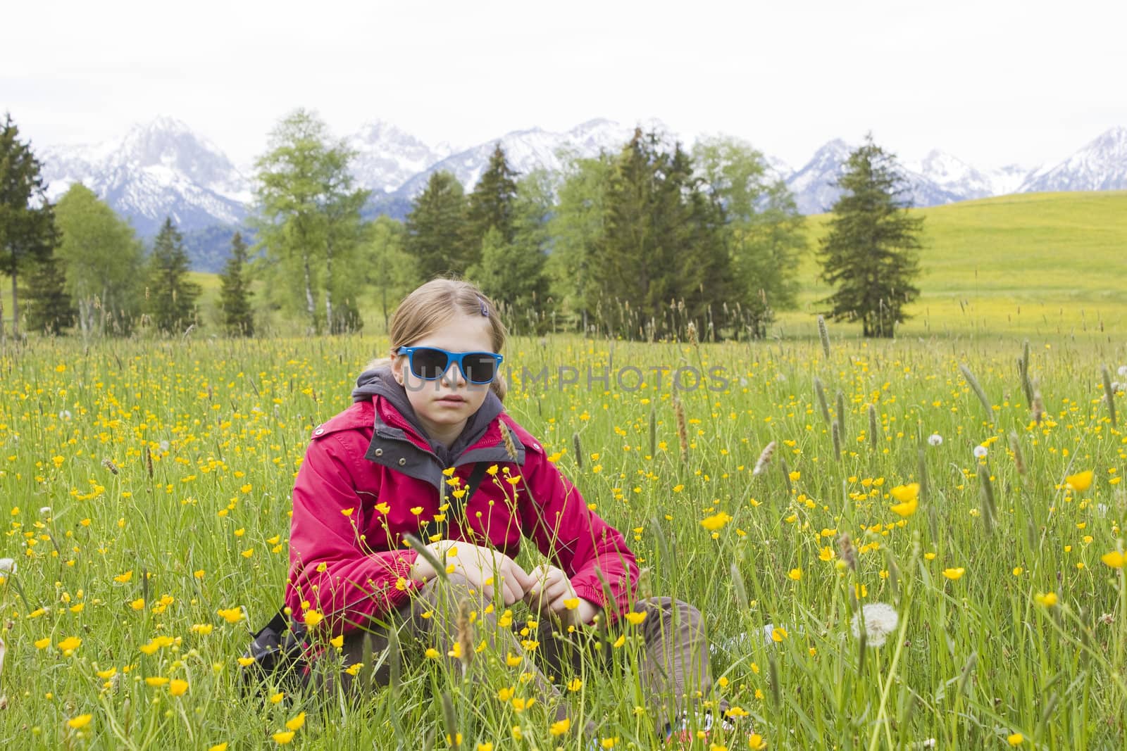 portrait of a girl against the panorama of the Alps by miradrozdowski