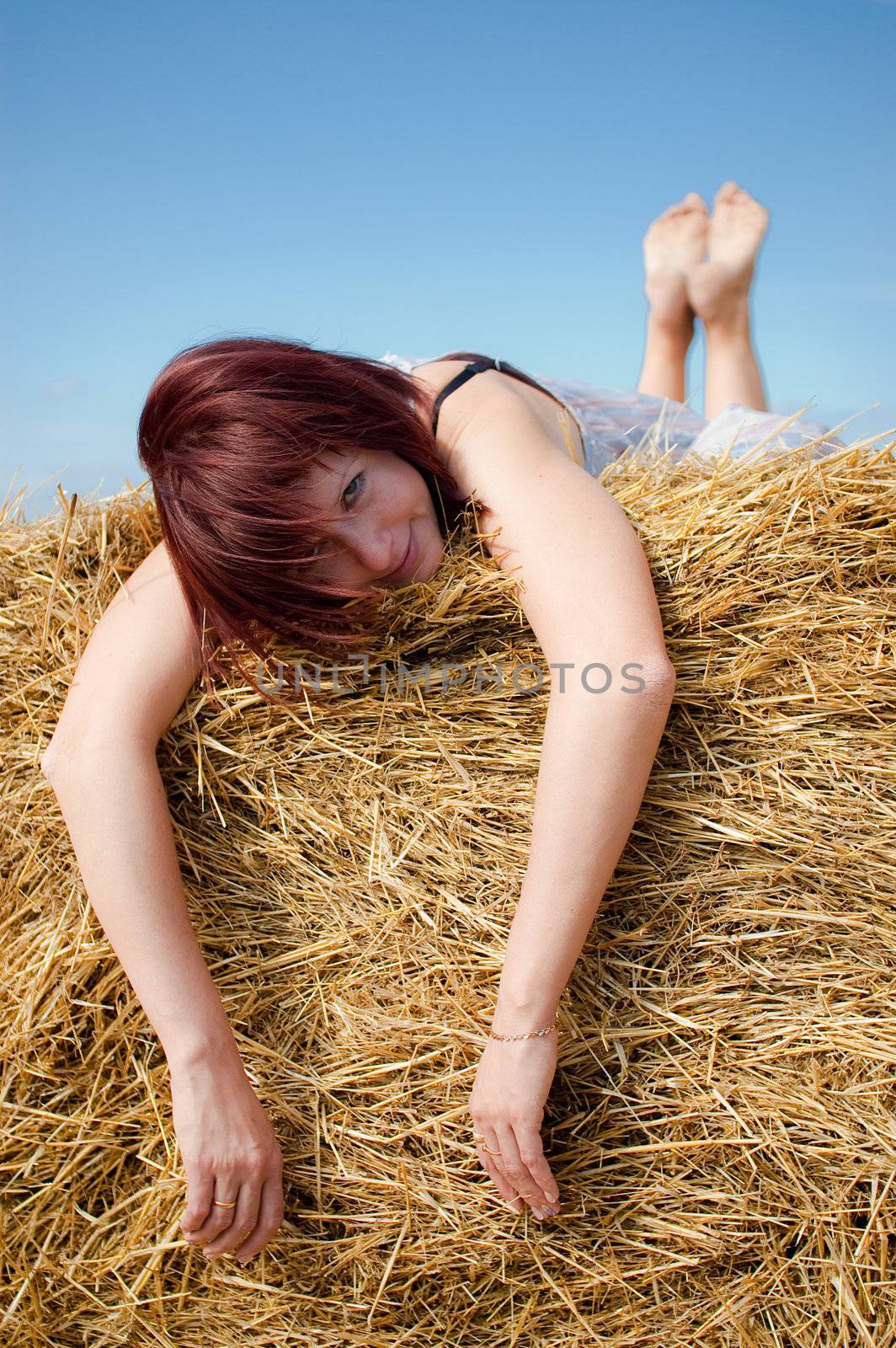 Woman on hay by Axel80