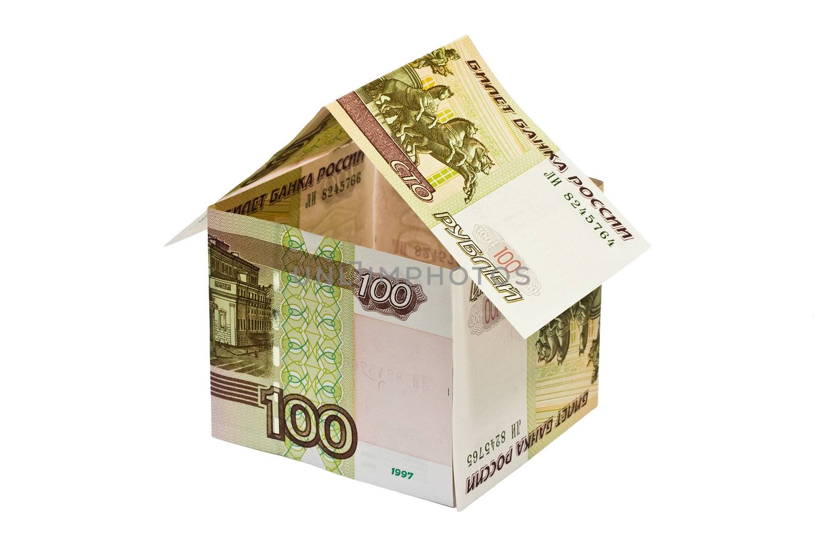house made of rubles banknotes on white background