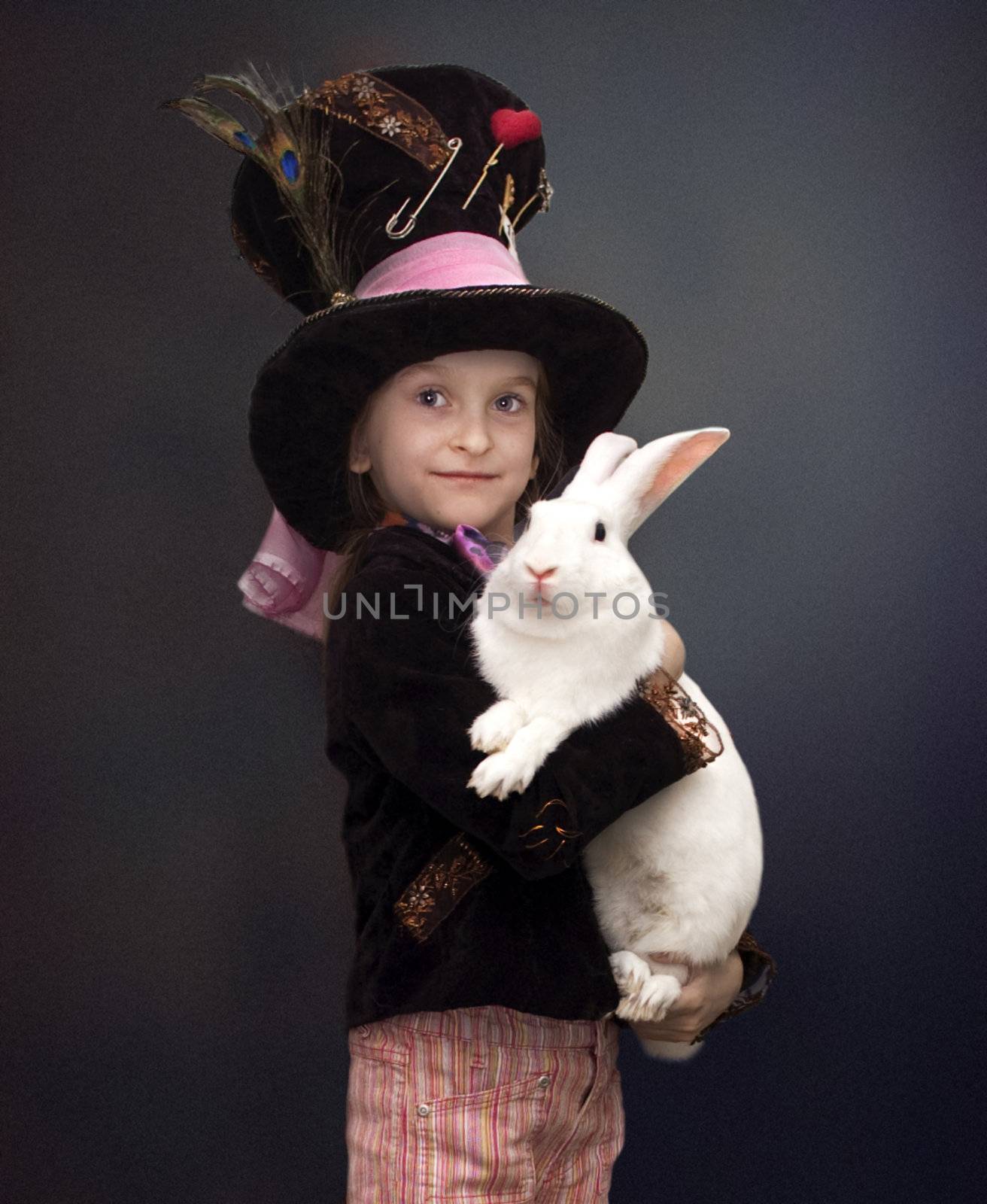 Girl in a hat and with rabbit