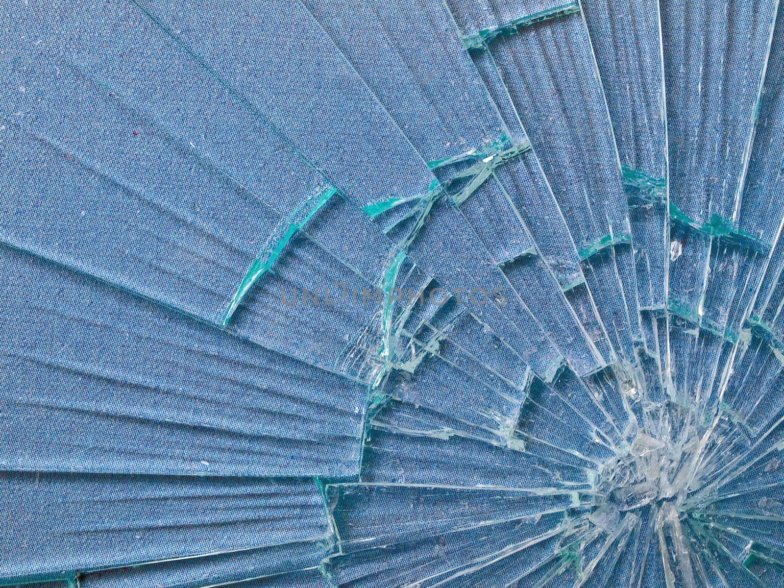Cracked Glass Macro with a Sky Blue Patterned Background by Frankljunior