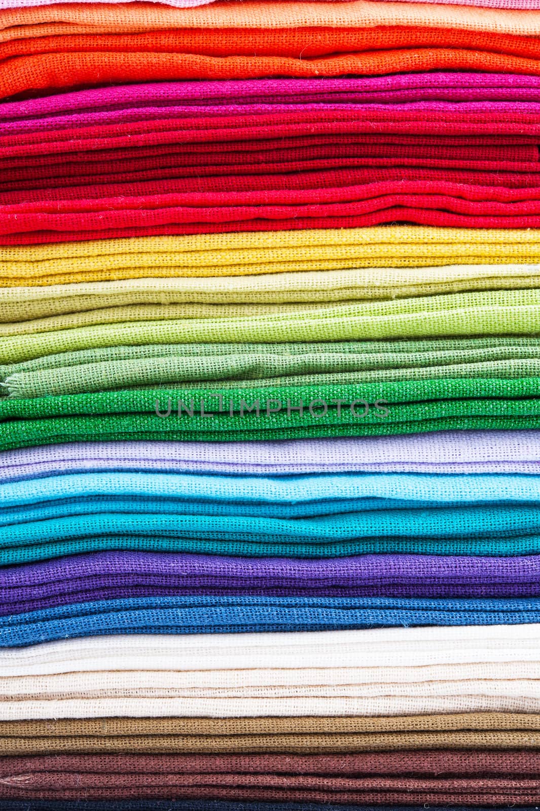 Background of a stack of linen fabric texture