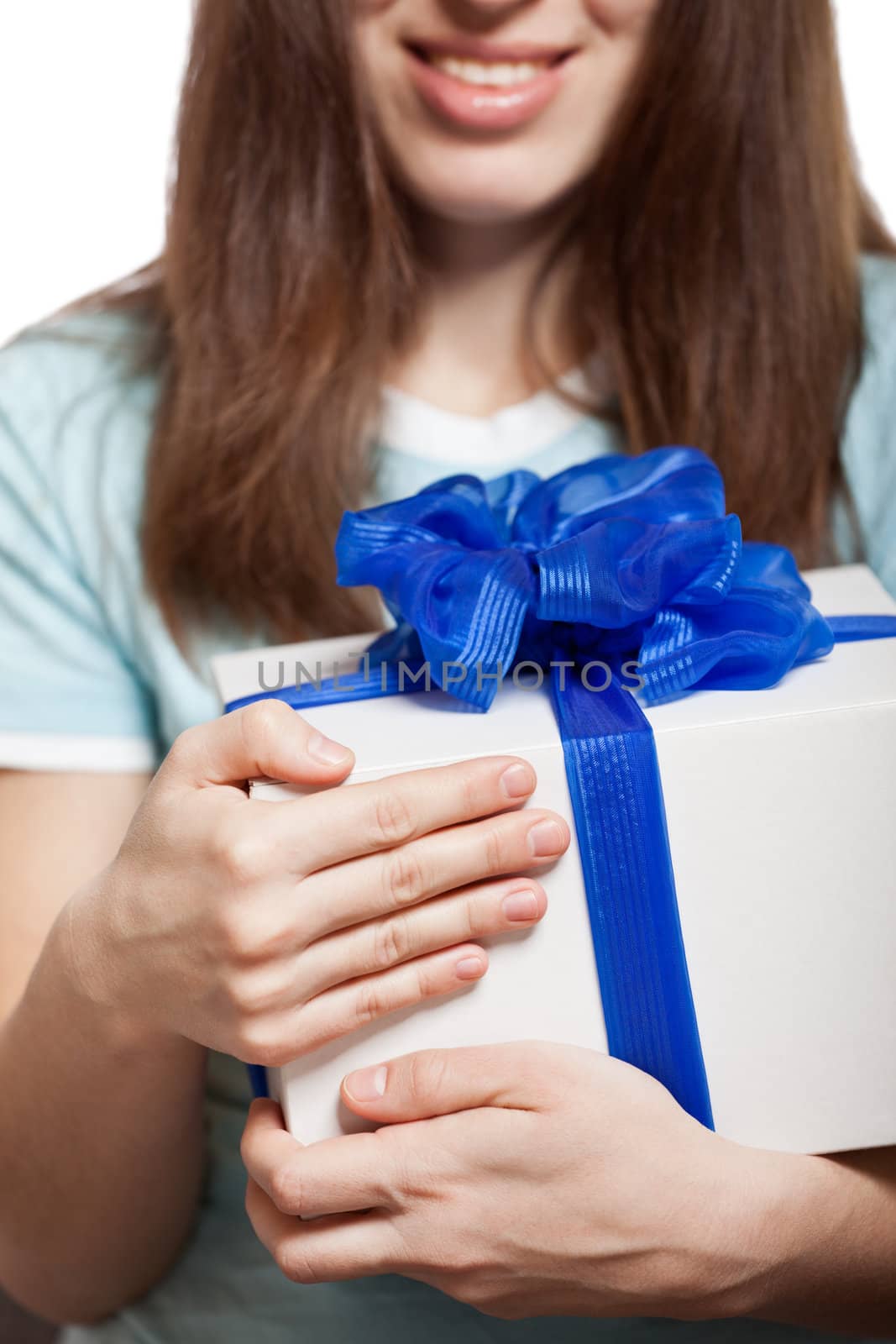 Woman hand holding gift or present box by ia_64