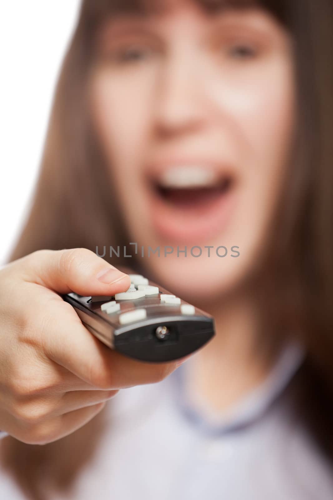 Woman hand holding tv channel remote control by ia_64