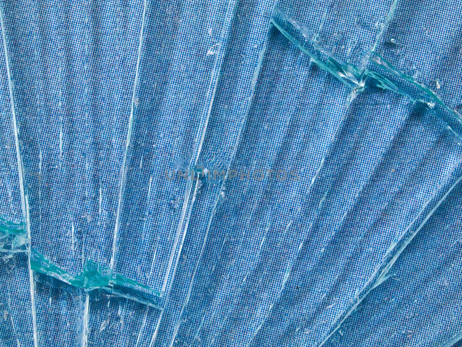 Cracked Glass Macro with a Sky Blue Patterned Background