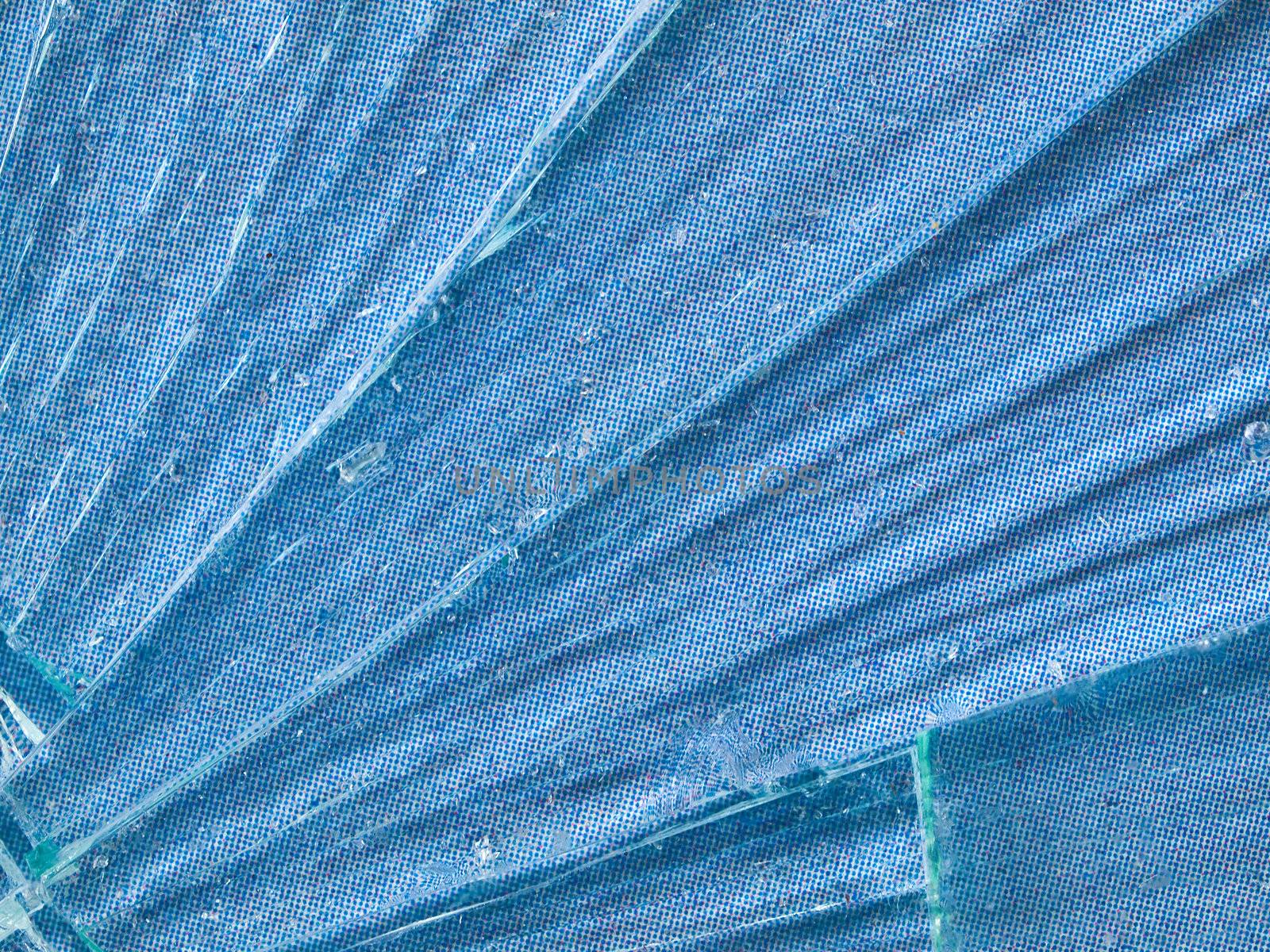 Cracked Glass Macro with a Sky Blue Patterned Background