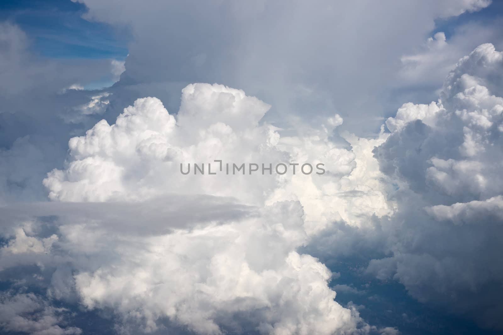 Aerial view on white fluffy clouds