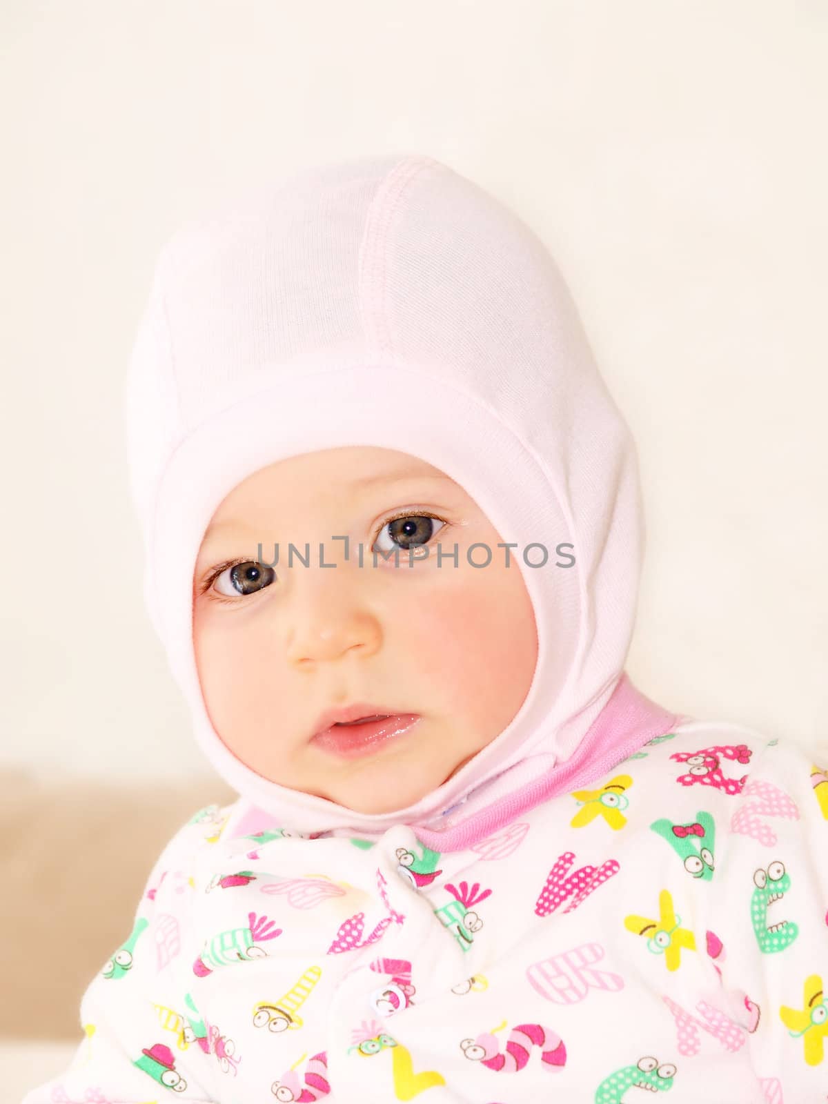 Beautiful baby girl, wearing a hood, and pajama by Arvebettum