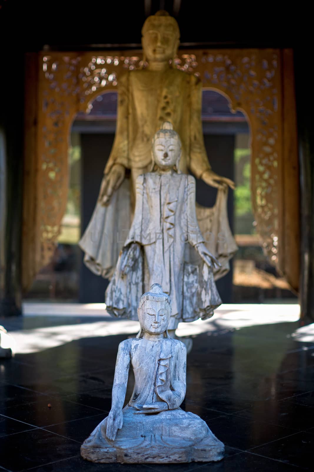 Three statues of Buddha in Bandaam Museum (AKA Black House or Black Temple) in Chiang Rai, Thailand