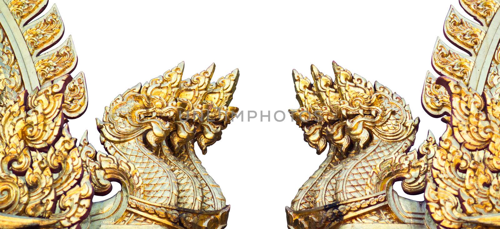 Figures of golden dragons isolated on the white background