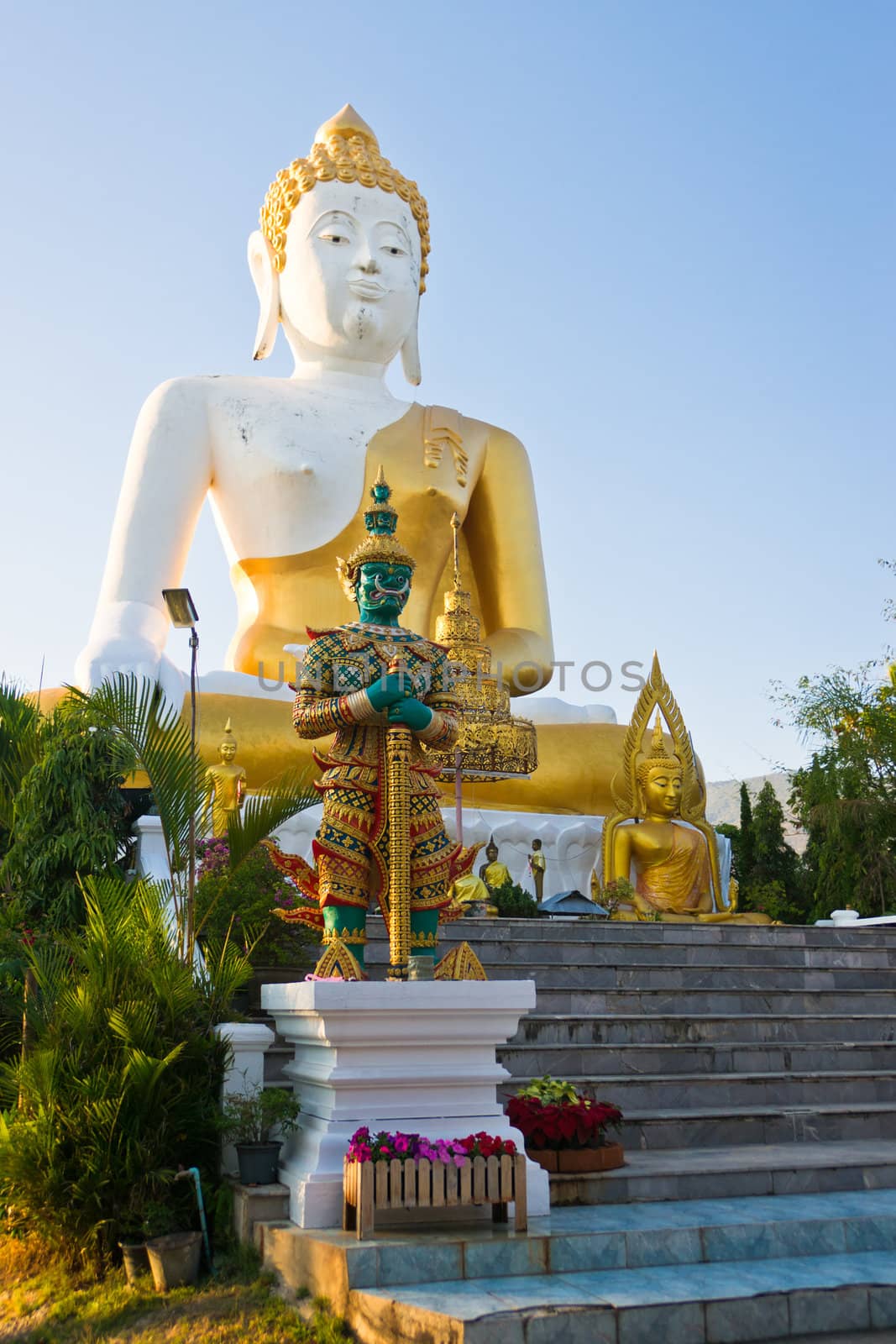 Statue of big Buddha in the temple Wat Doikam, Chiang Mai, Thailand