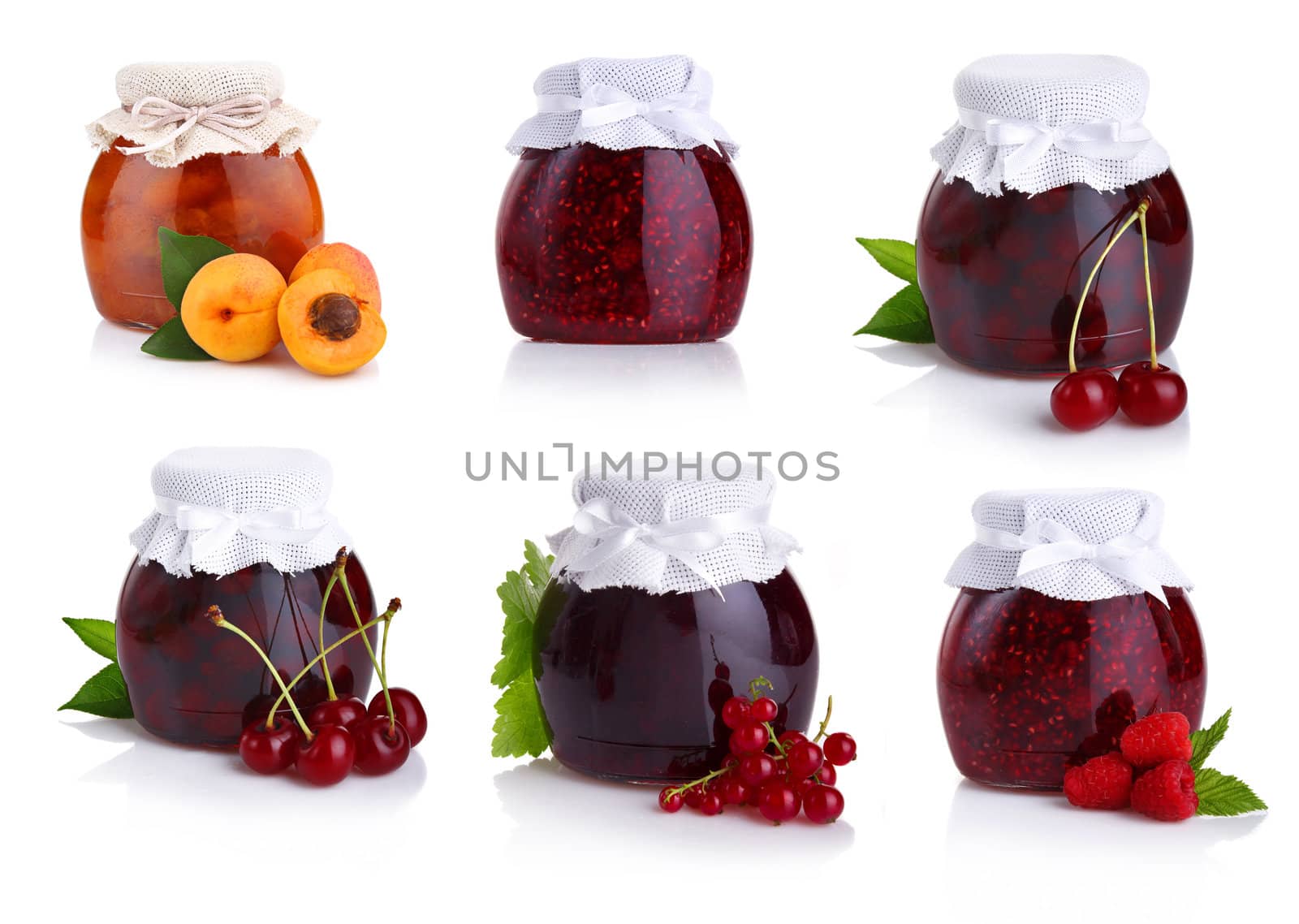 Set of jars with berry jam isolated on white background