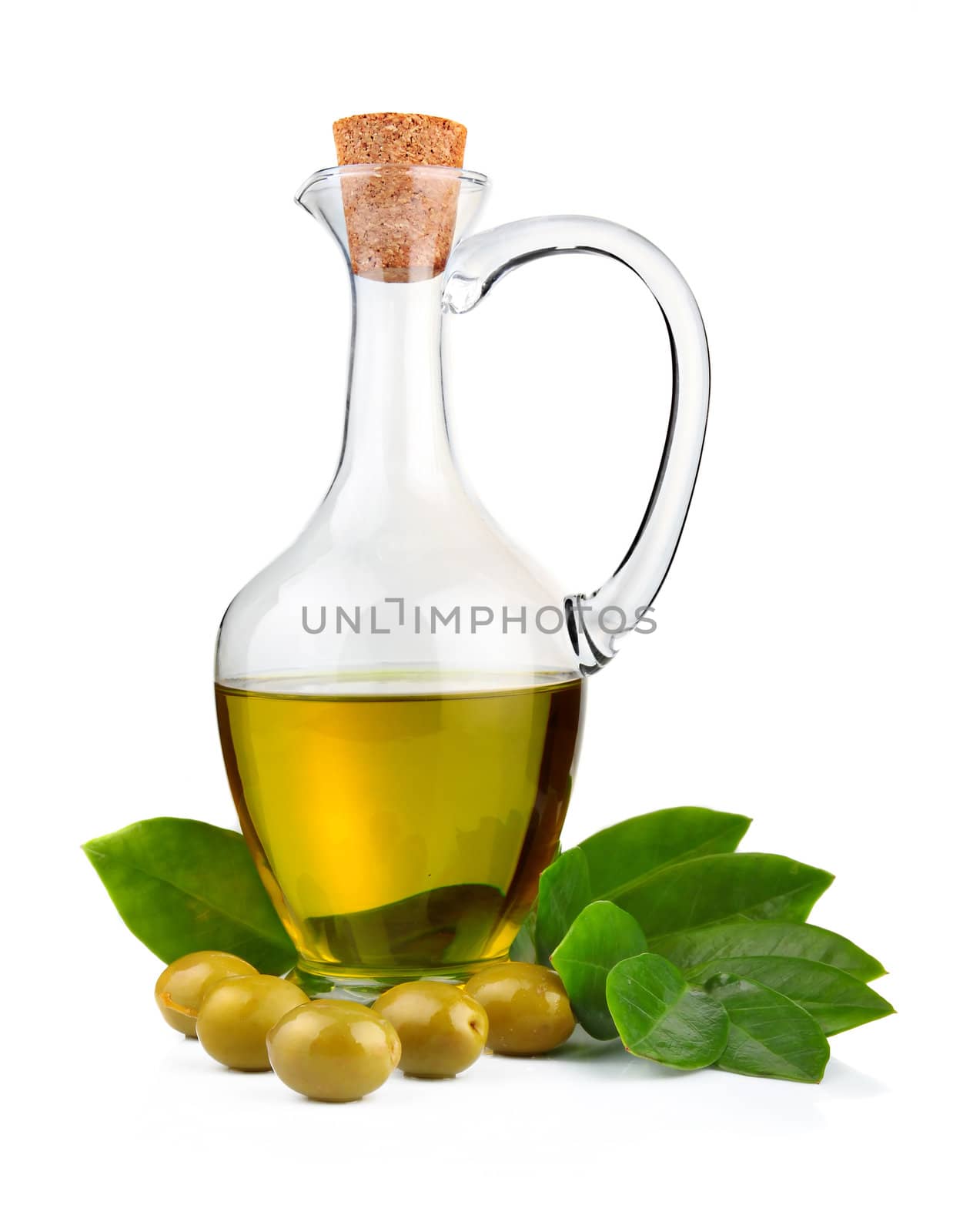 Bottle of olive oil and green leaves isolated on white background
