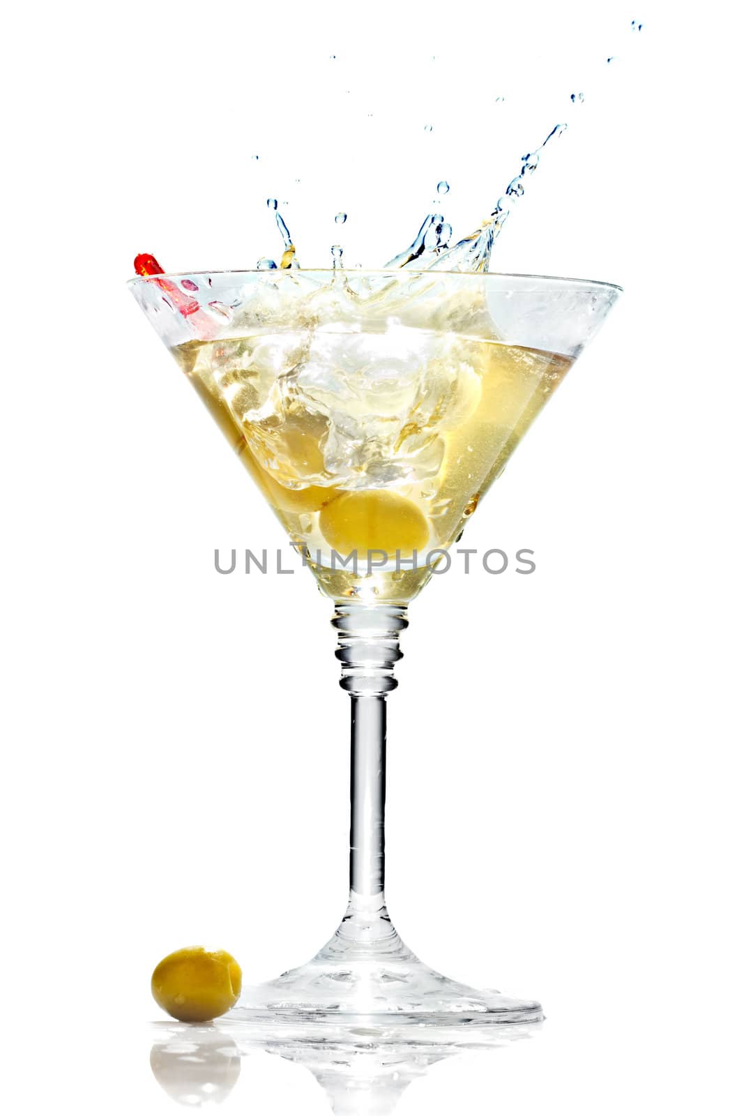 Olive splashing on martini glass isolated by alphacell