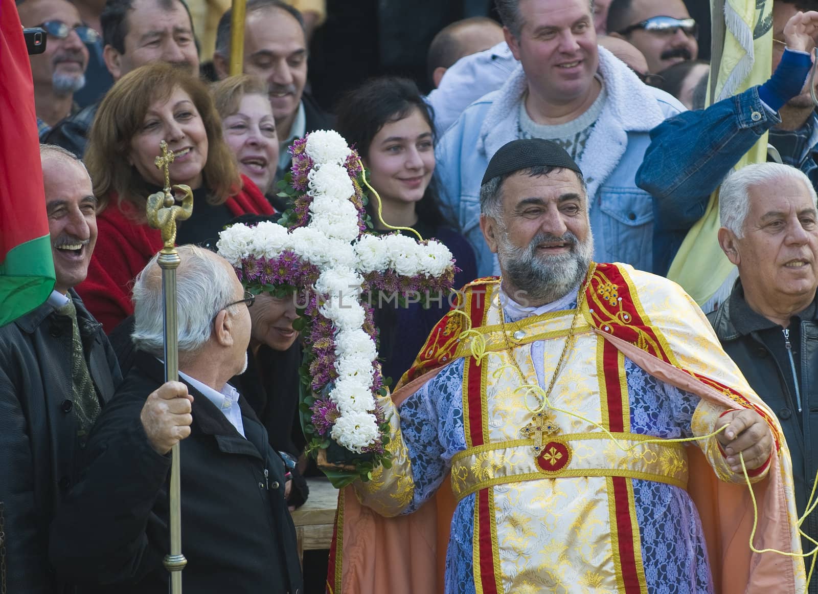 QASER EL YAHUD , JORDEN - JAN 19 : Syrian Orthodox Christians participates in the annual baptising ceremony during the epiphany at Qaser el yahud , Jorden in January 19 2012