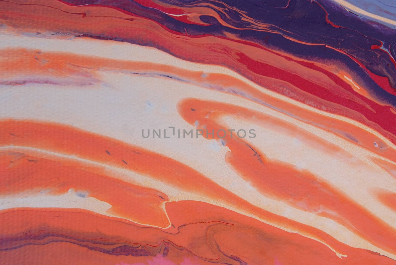 A bright, colorful abstract background created by wet paints mixing on a rotating canvas.