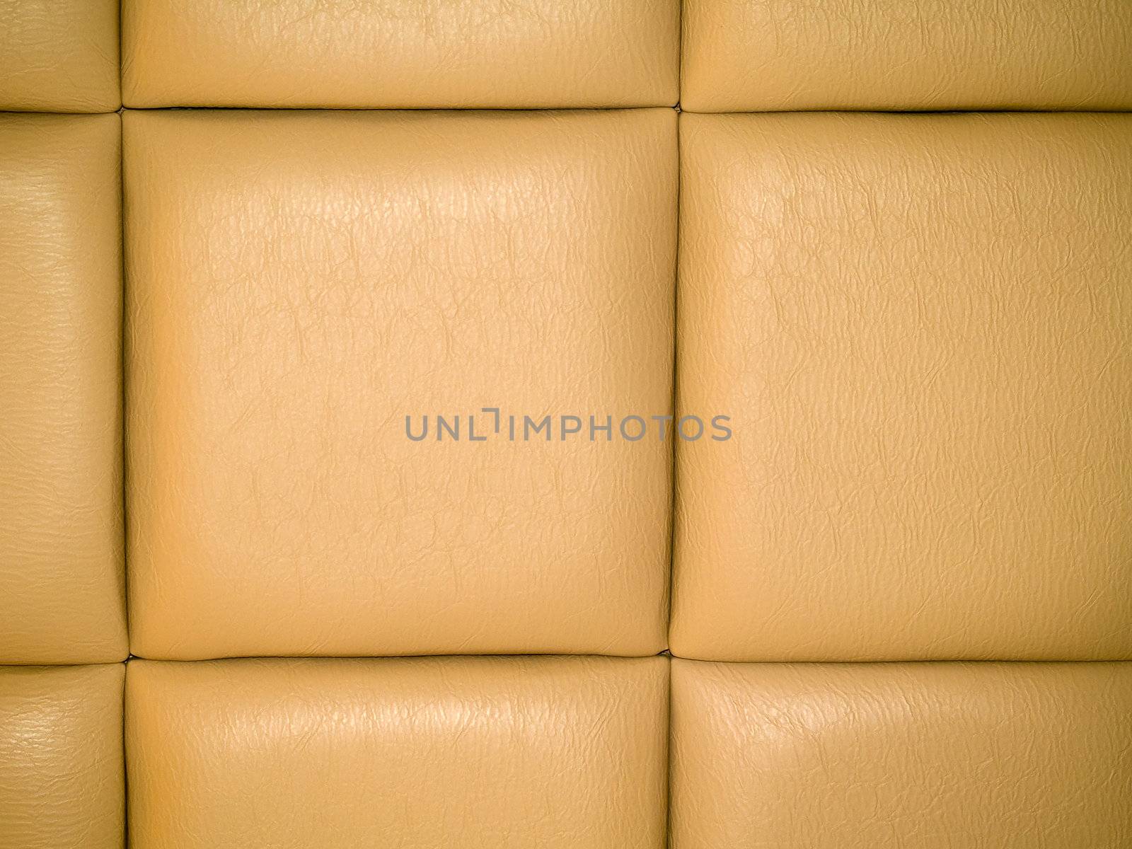 Tan Leather Upholstery Background with a Repetitive pattern
