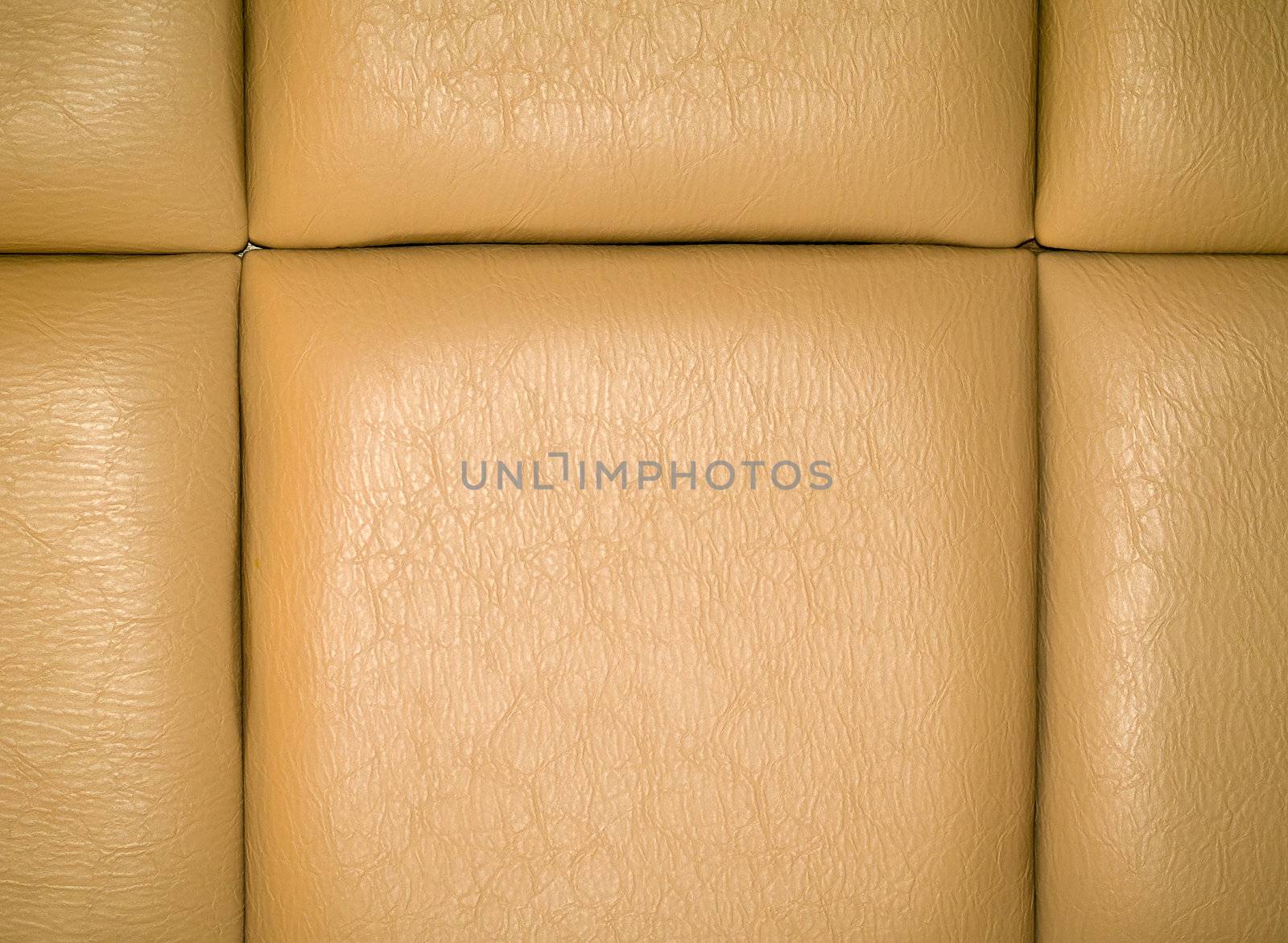 Tan Leather Upholstery Background with a Repetitive pattern