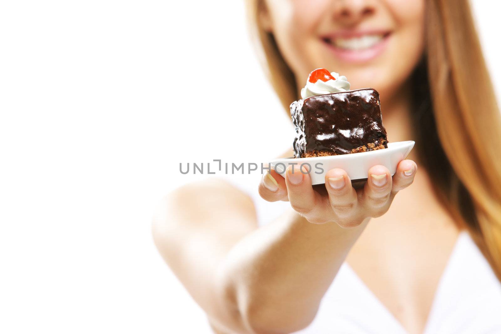 Young woman holding cake