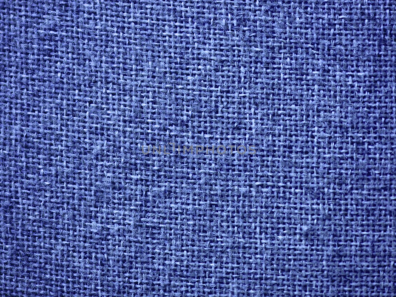 Blue burlap fabric closeup for texture and backgrounds