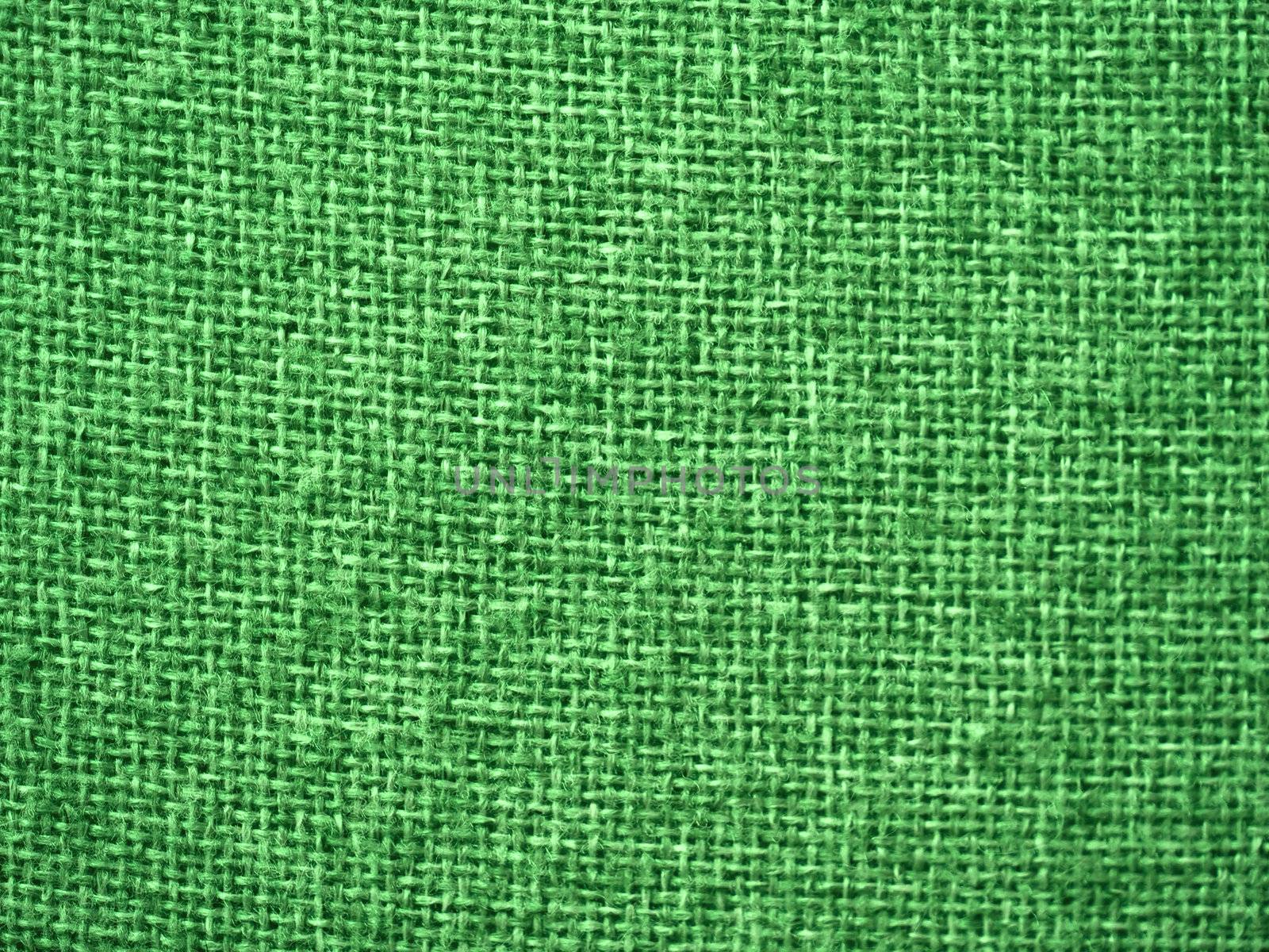 Green burlap fabric closeup for texture and backgrounds