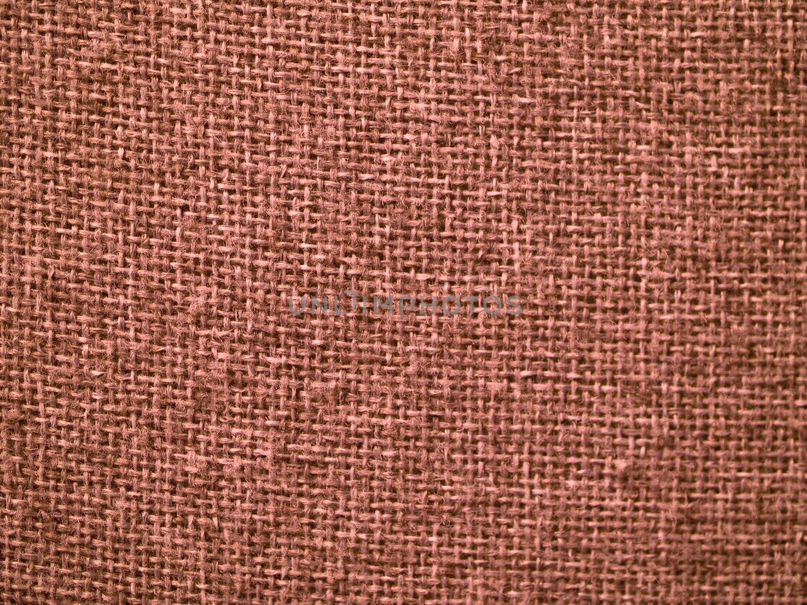 Red burlap fabric closeup for texture and backgrounds