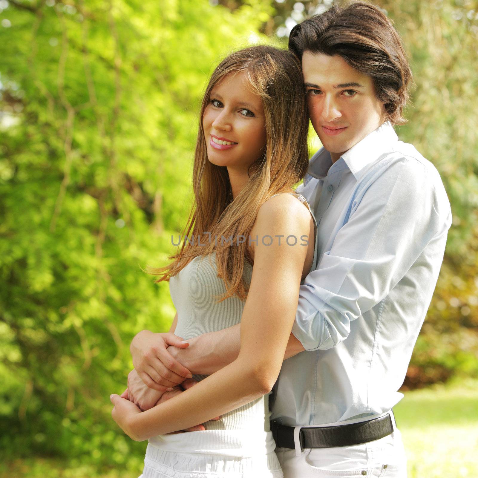 portrait of a young couple in love in the park