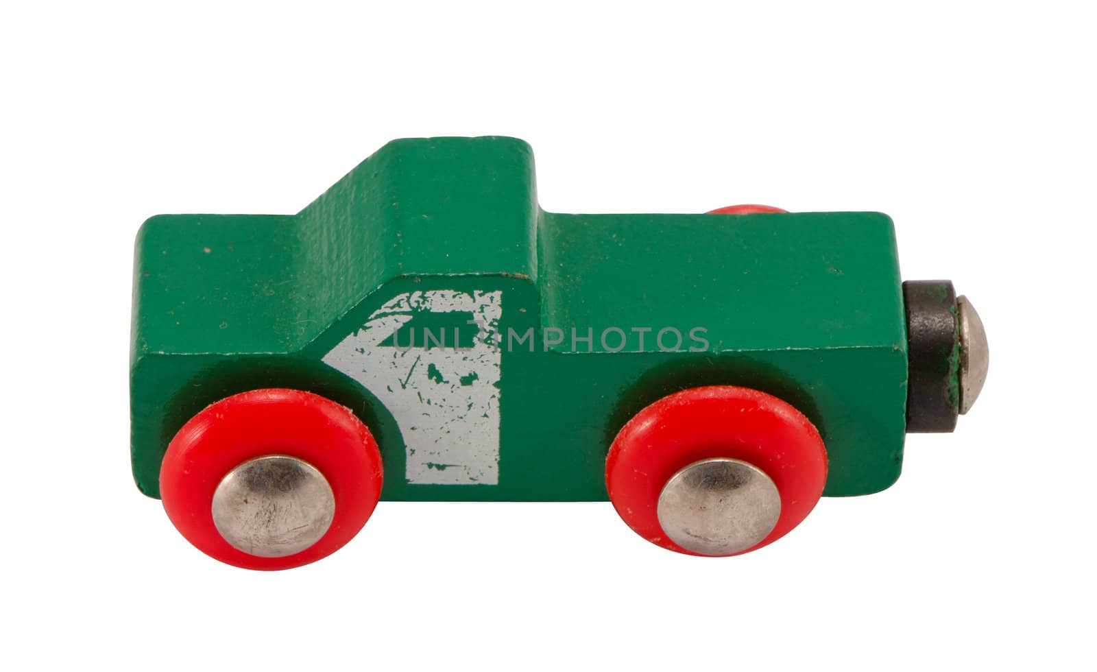 Wooden green retro toy car isolated on white background.