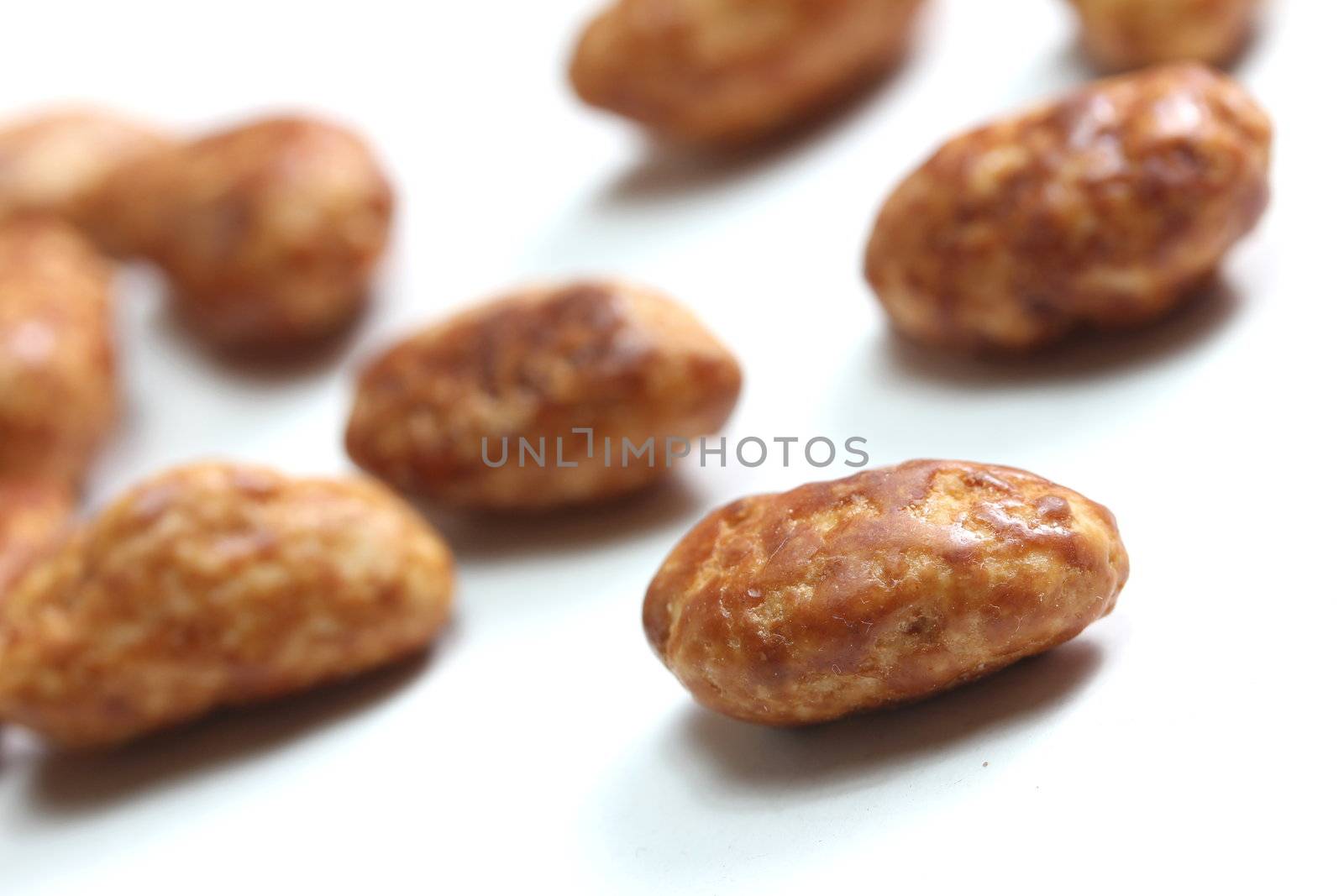 isolated roasted almonds