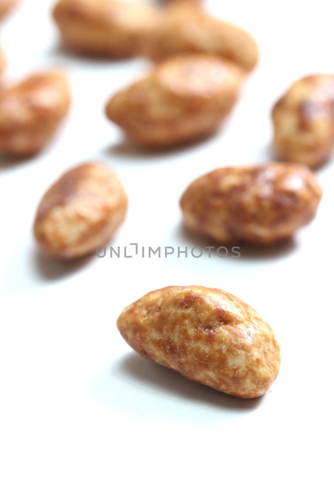 isolated roasted almonds