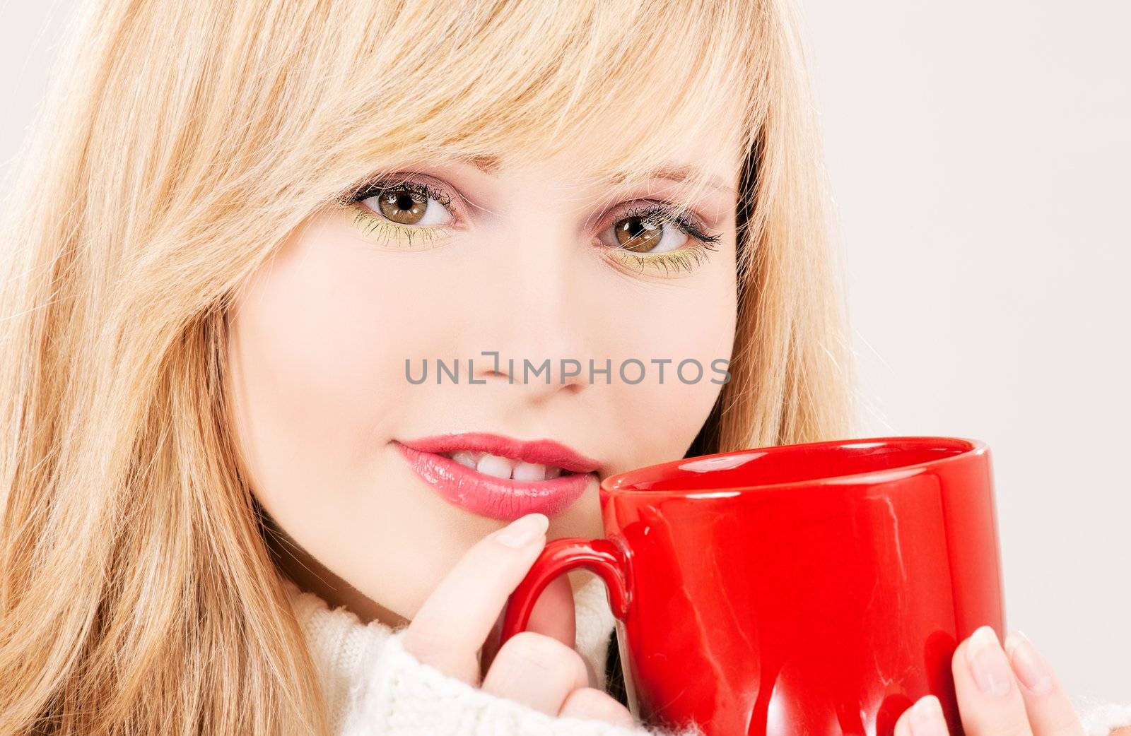 picture of happy teenage girl with red mug