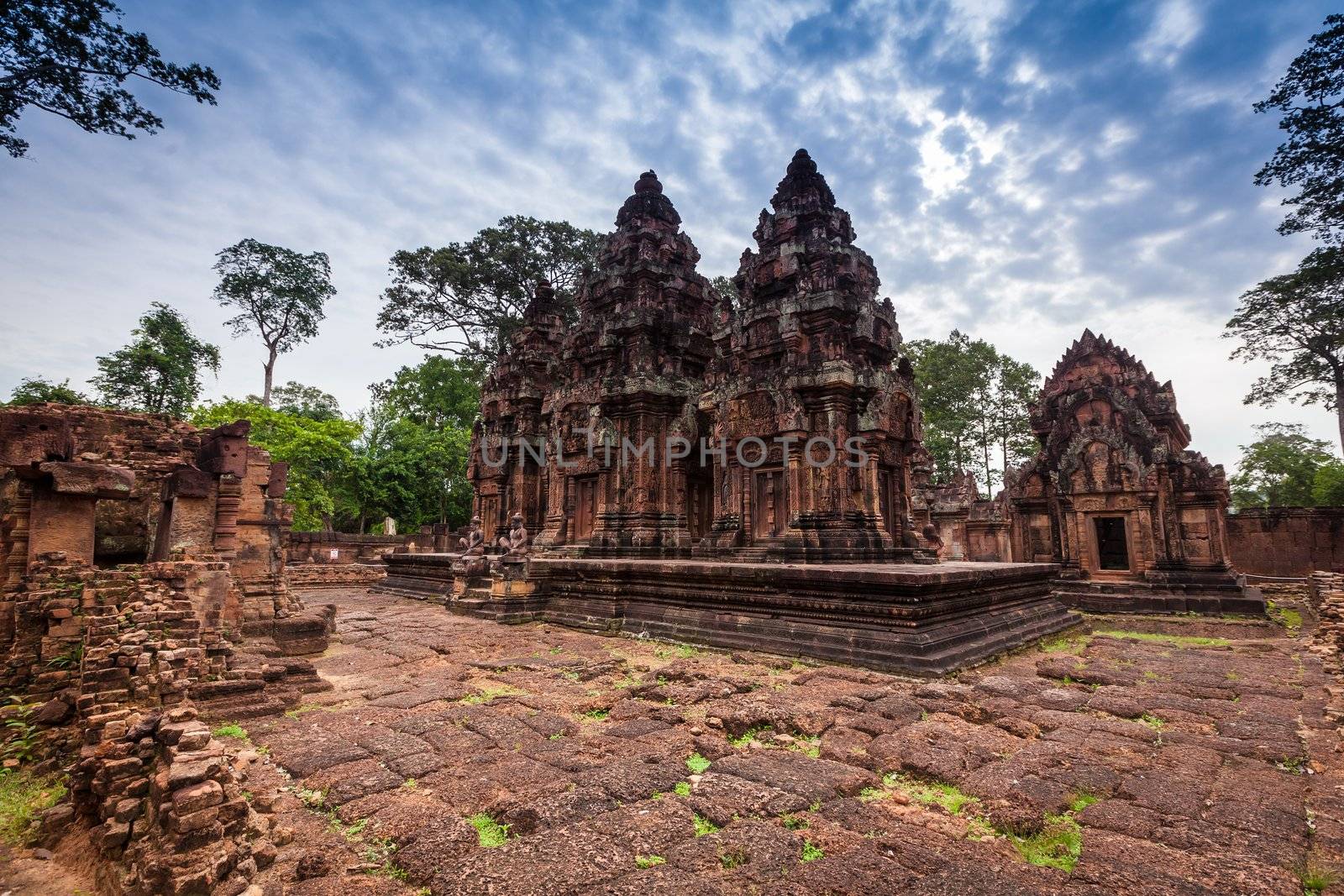 Amazing pink temple of Banteay Srei June 2012 in SIEM REAP, CAMBODIA. Banteay Srei is a decorated with elaborate carvings in much more detail than any other temple around Angkor.